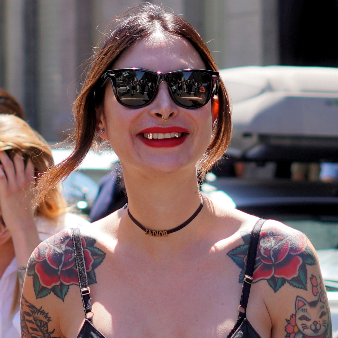 Reflected self-portrait on model with golden canines