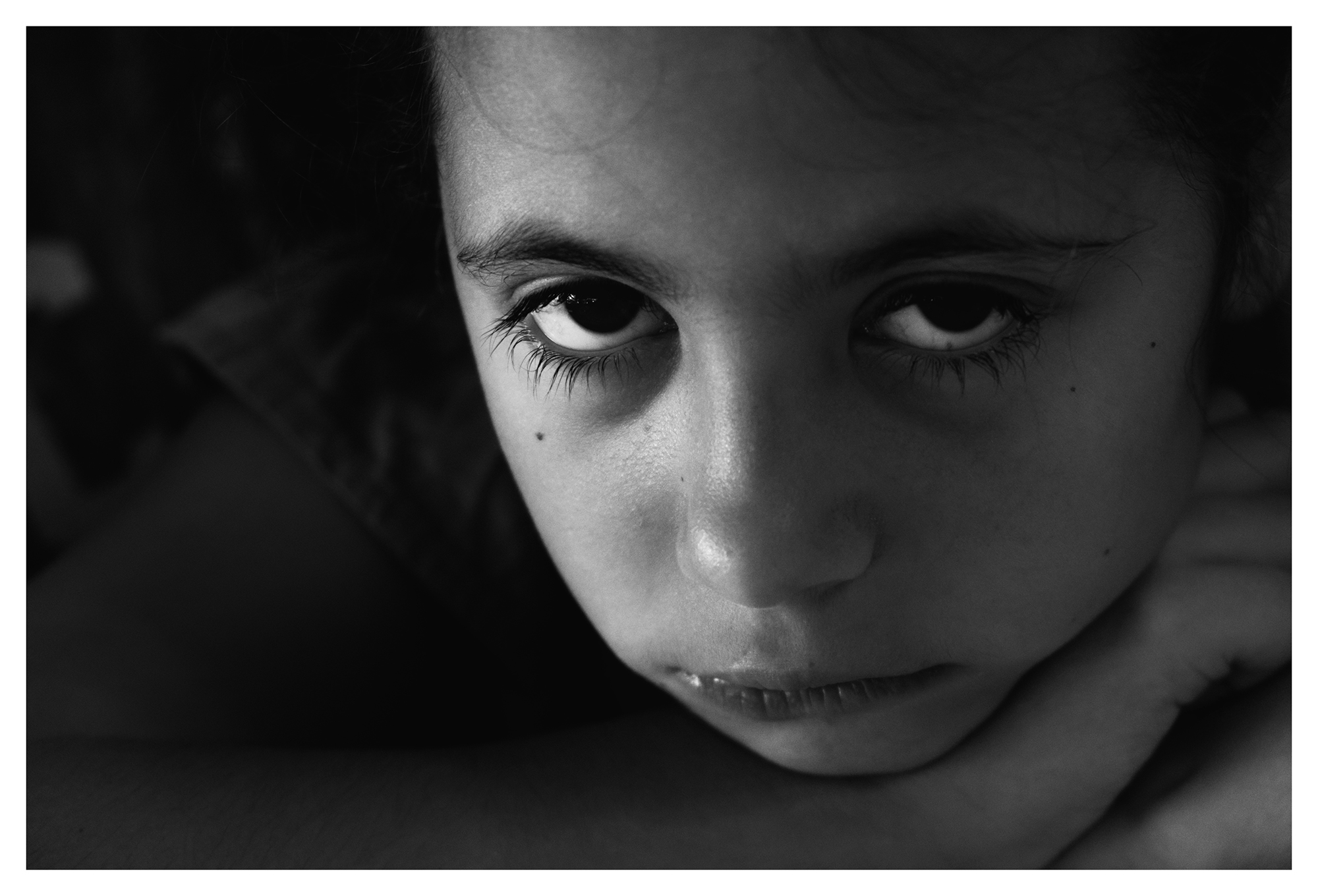 With a frowned look ....