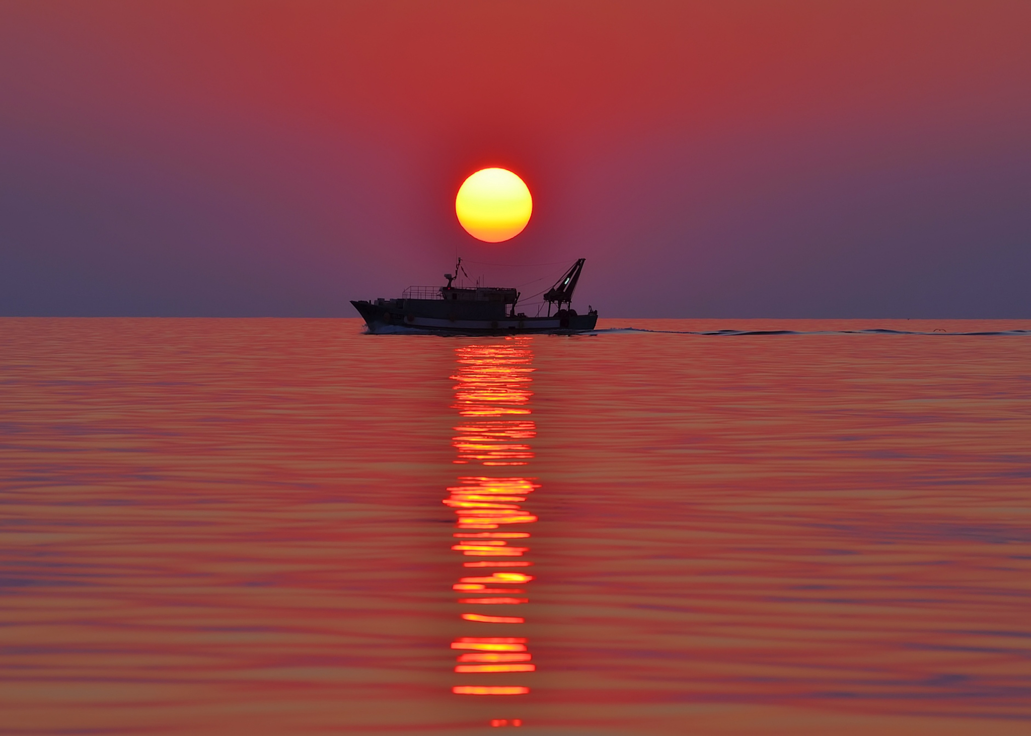 Peschereccio all'alba