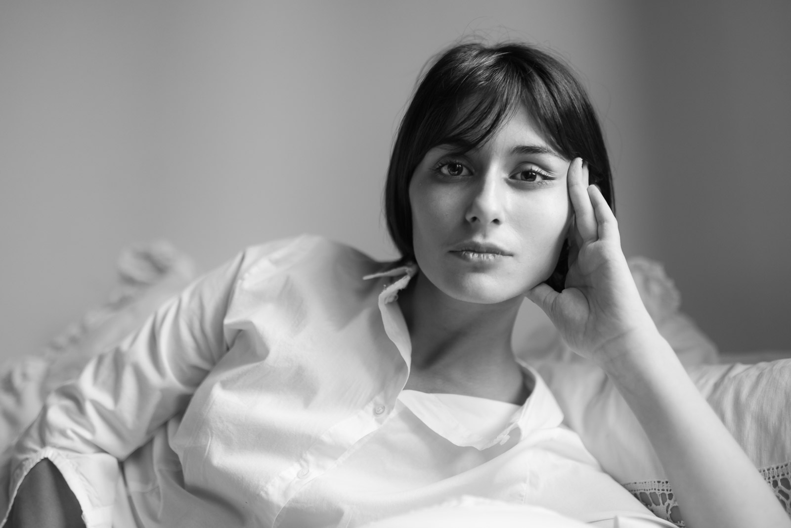 Alessandra is lying down