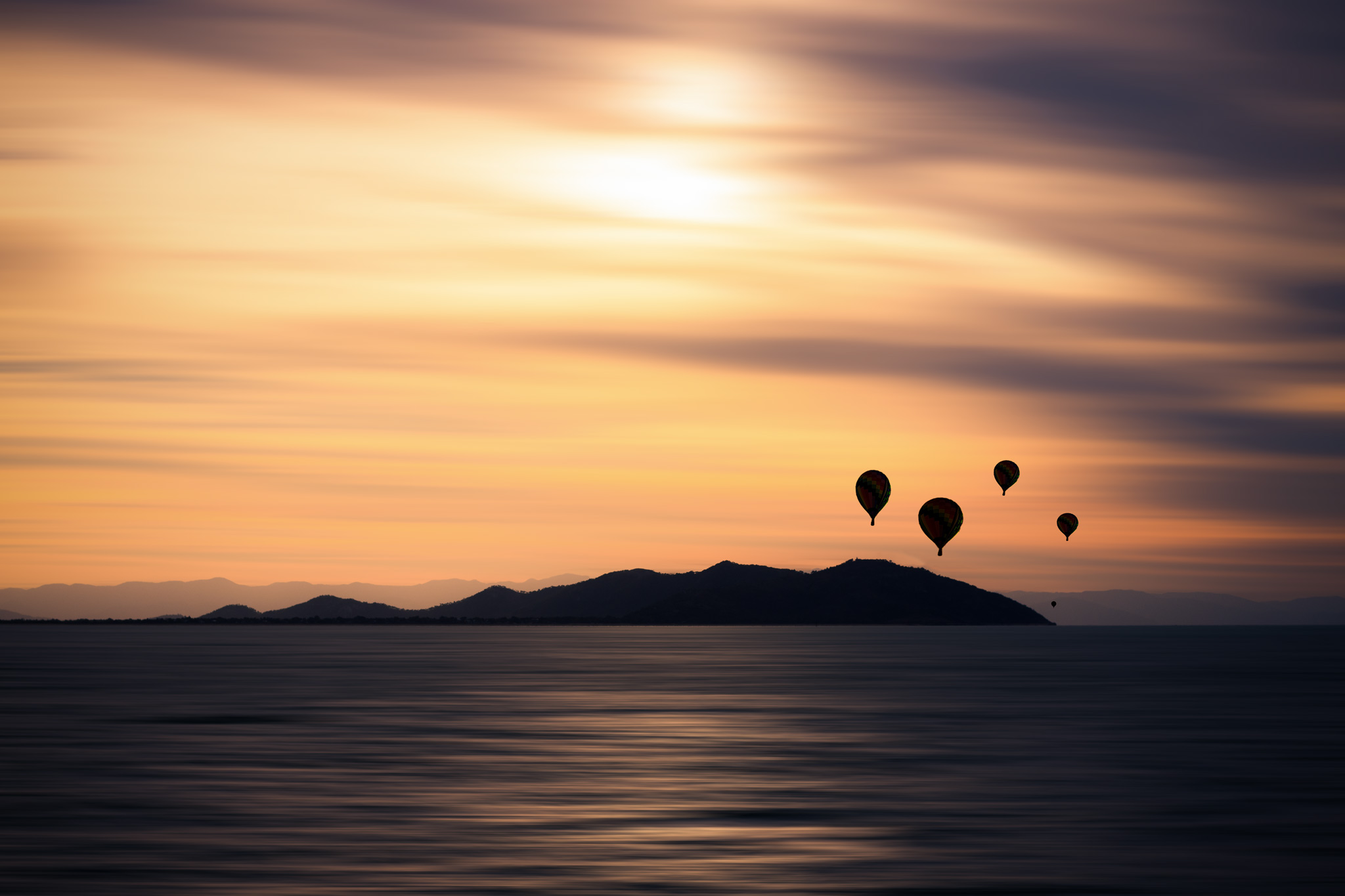 balloons at sunset.