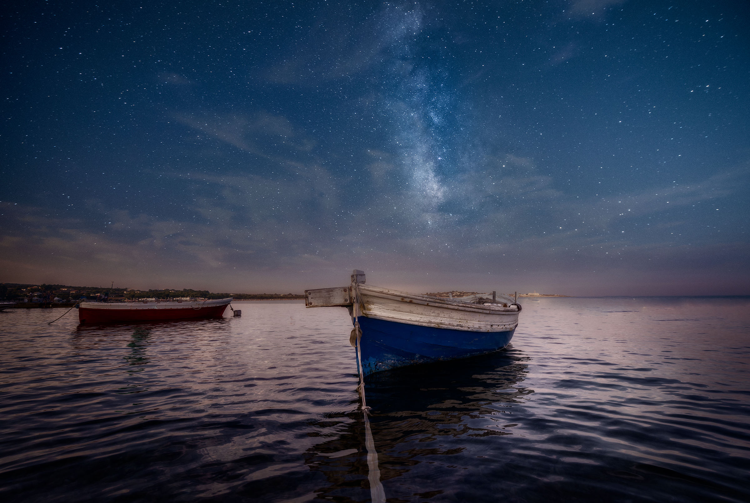And under the stars the boats rest