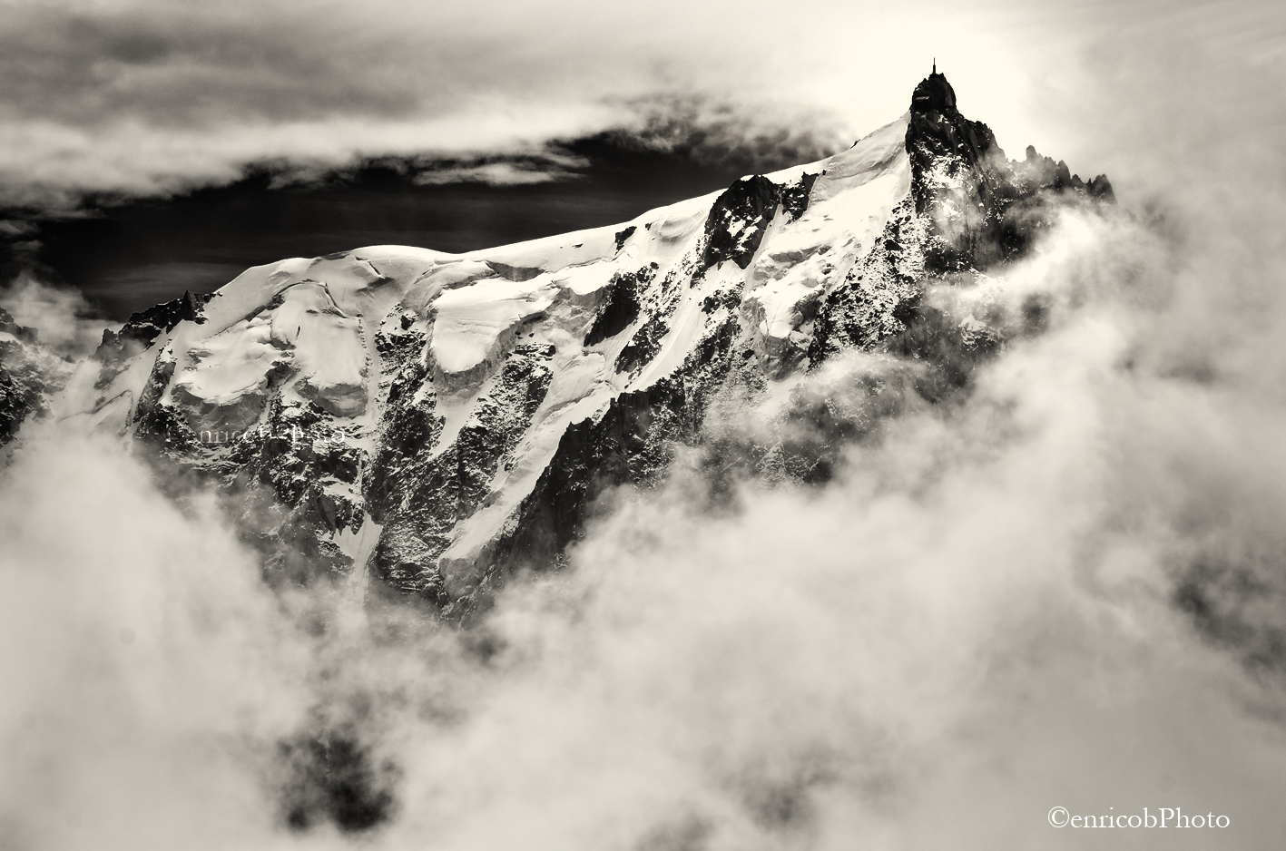 Aguille du Midi in a window of white clouds