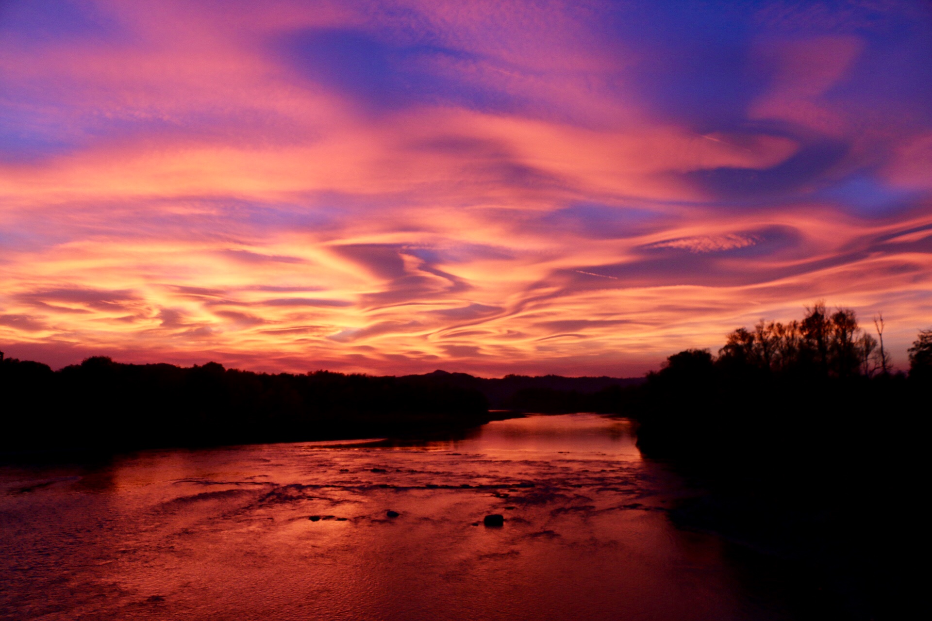 Amazing sunset over the river Po.