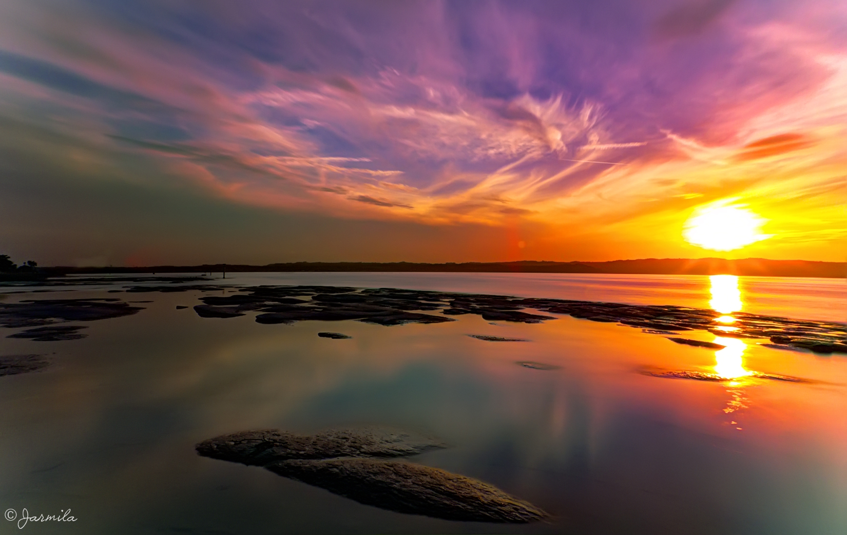 the sun and 'sunset on the lake