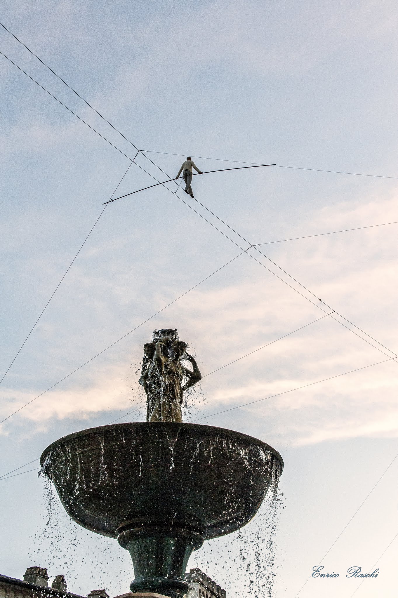 Suspended above the fountain