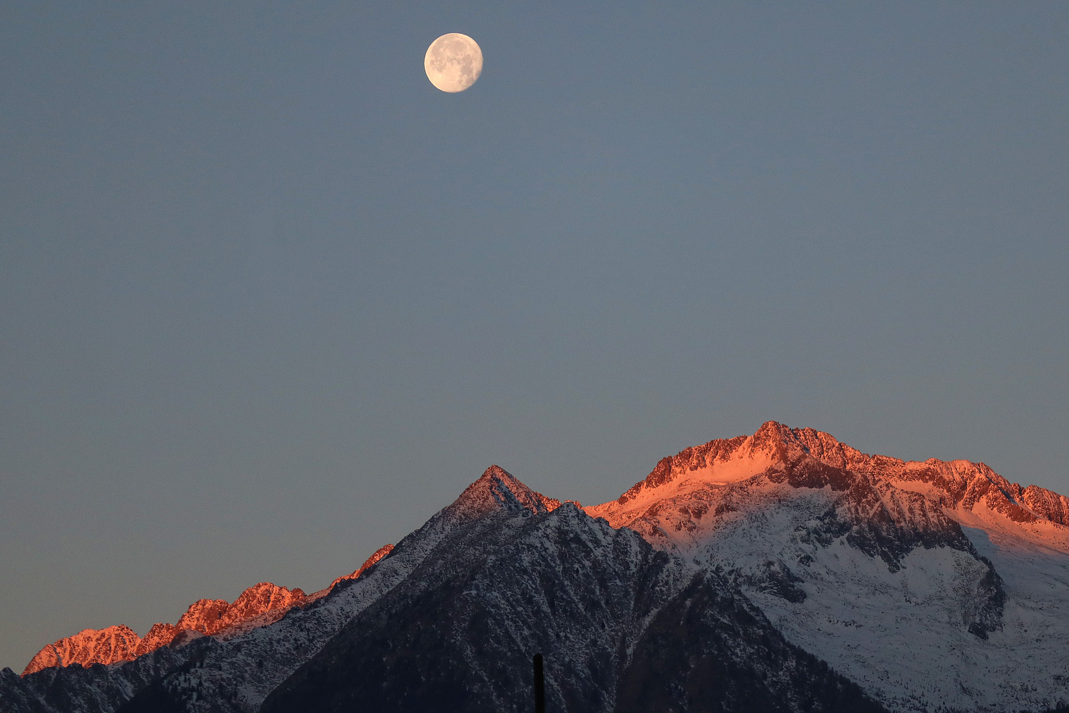 the sun rises, the moon sets