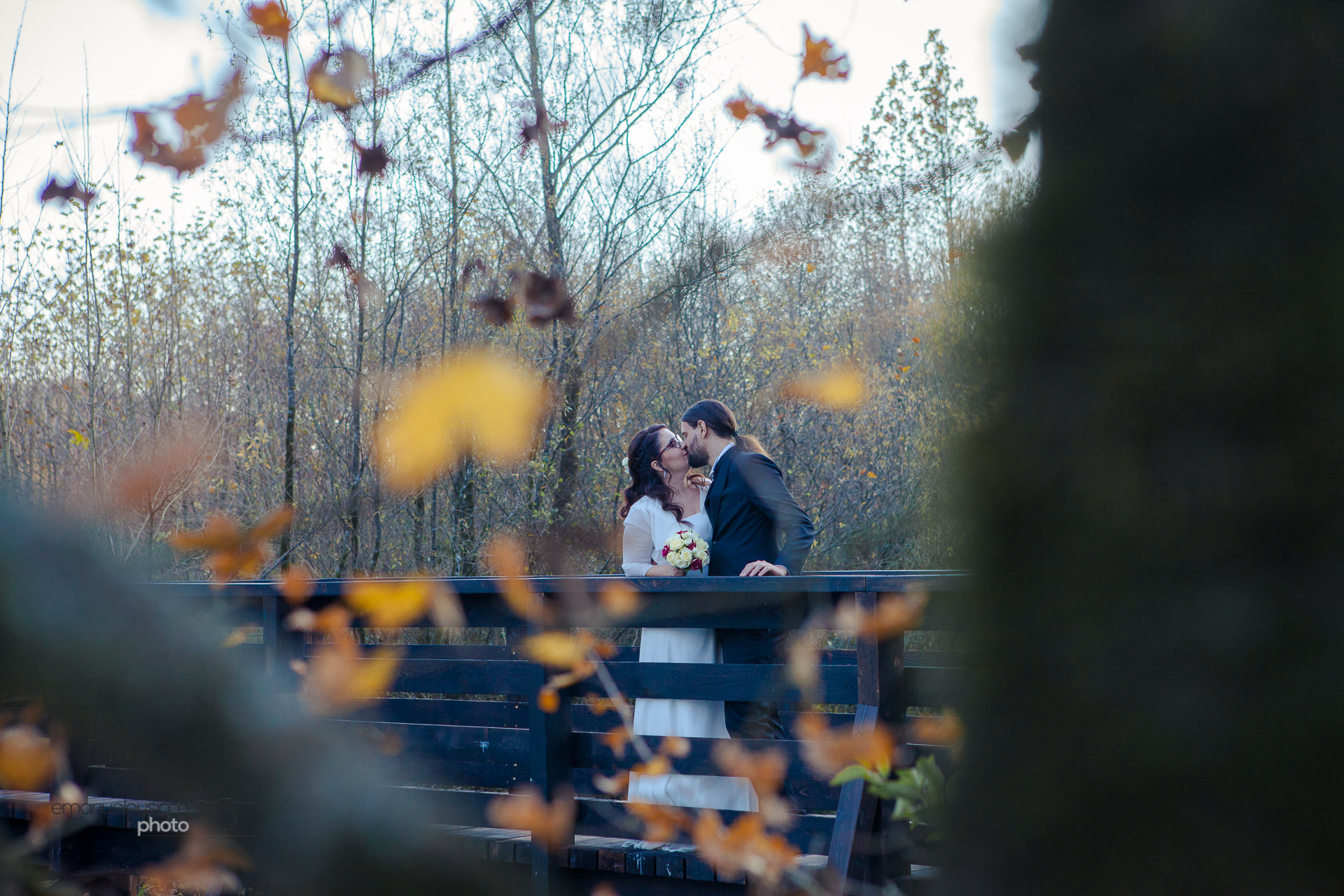 Bride and groom in the autumn