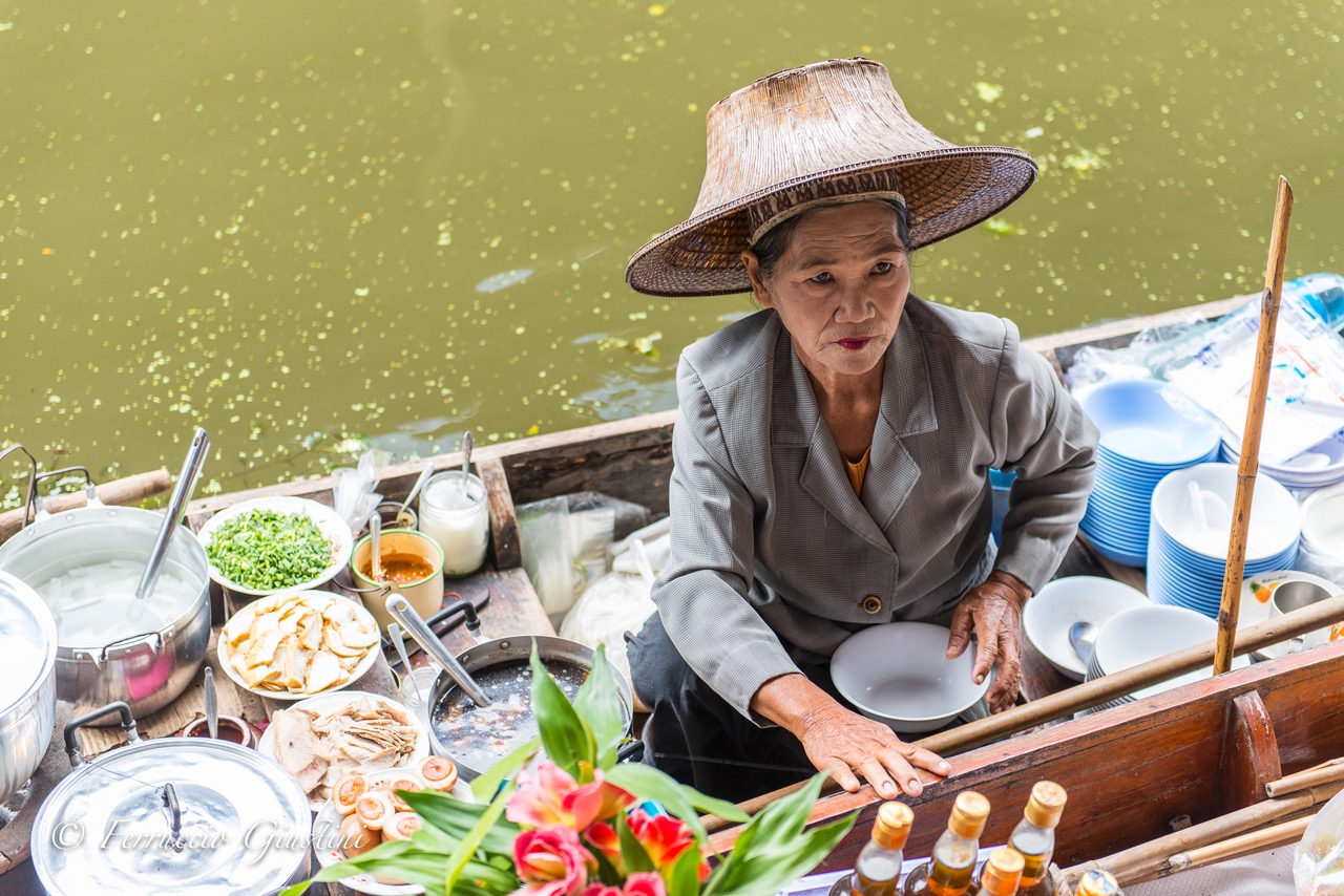 Woman at the Thai floating market
