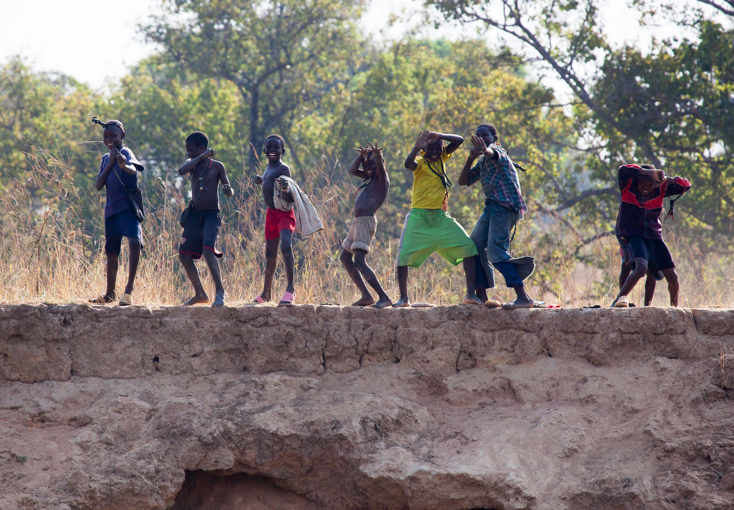 Children on the river bank