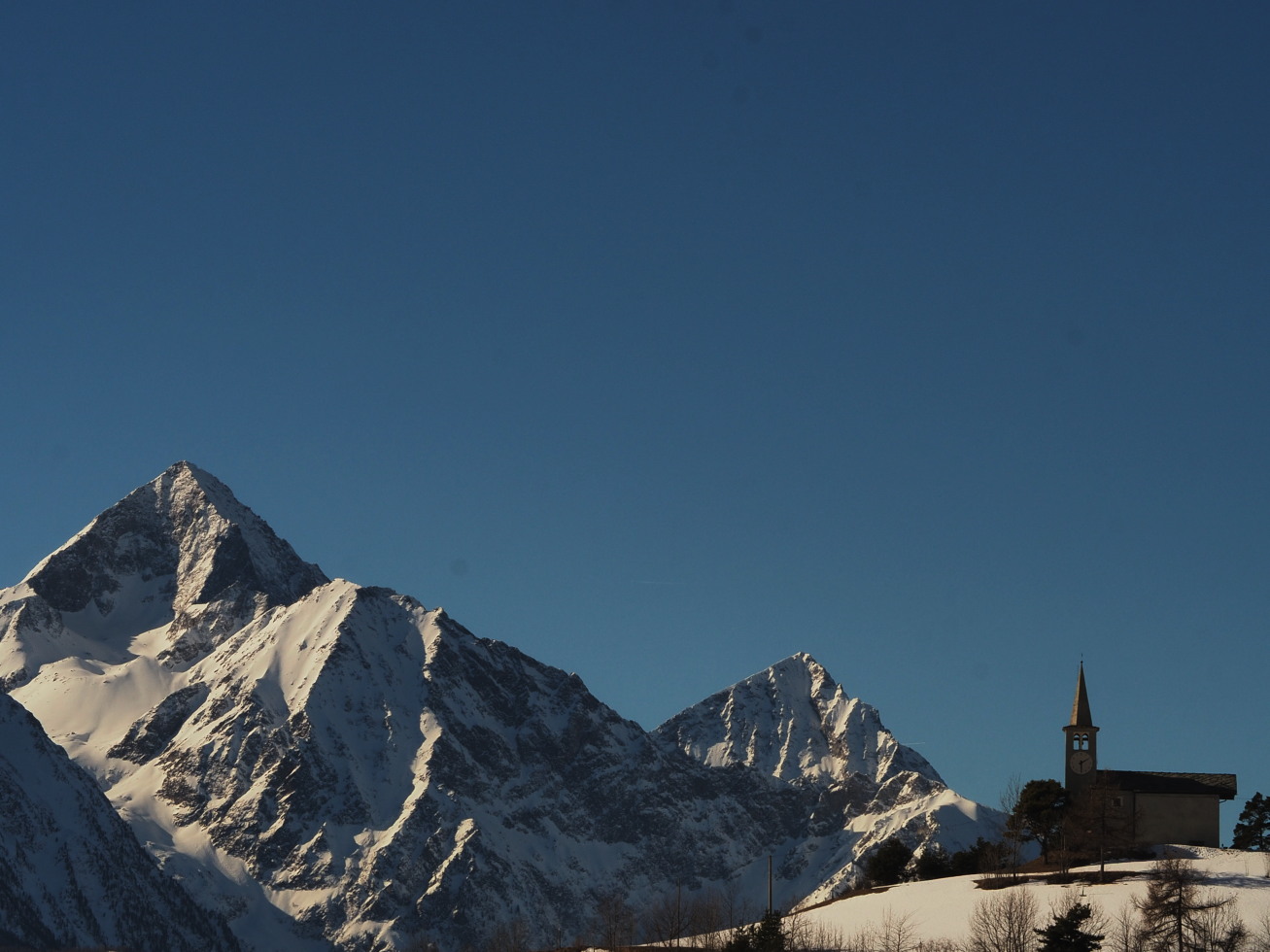 and behind Mount Emilius