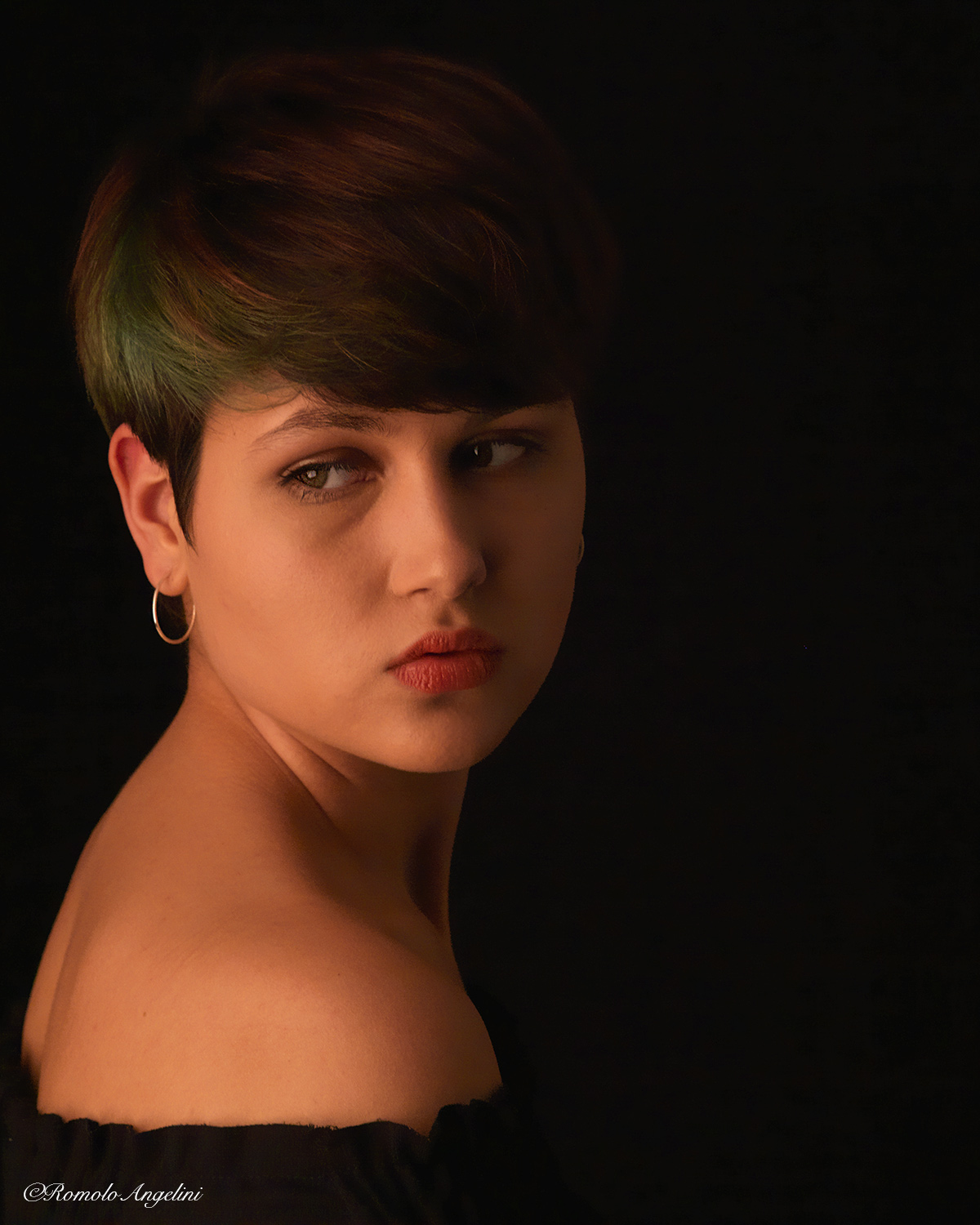 Judith with an earring.