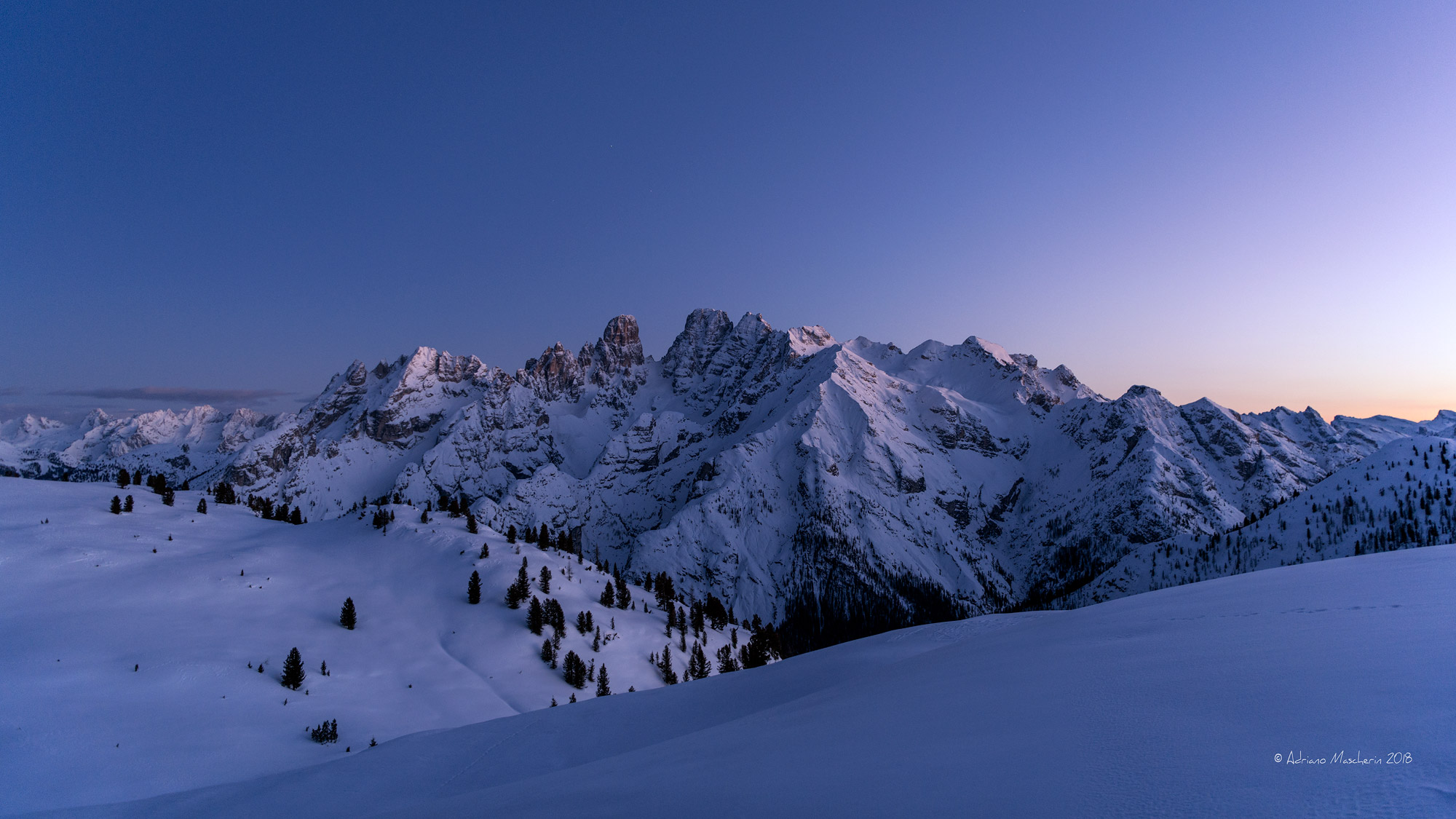 Blue hour on the Cristallo group