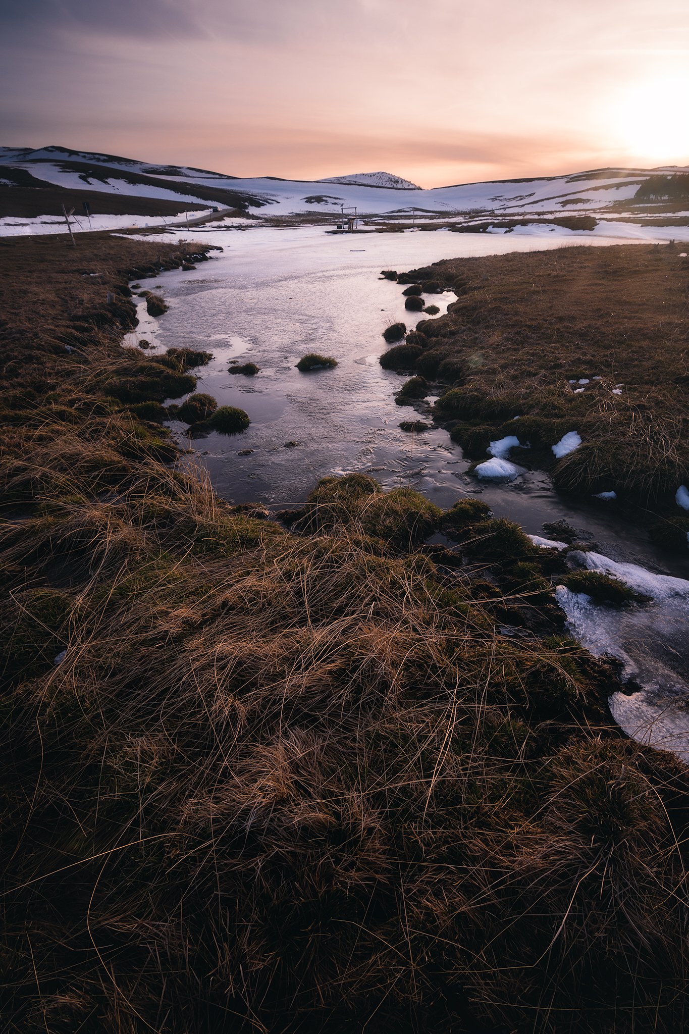 Sunset over water by Racollo