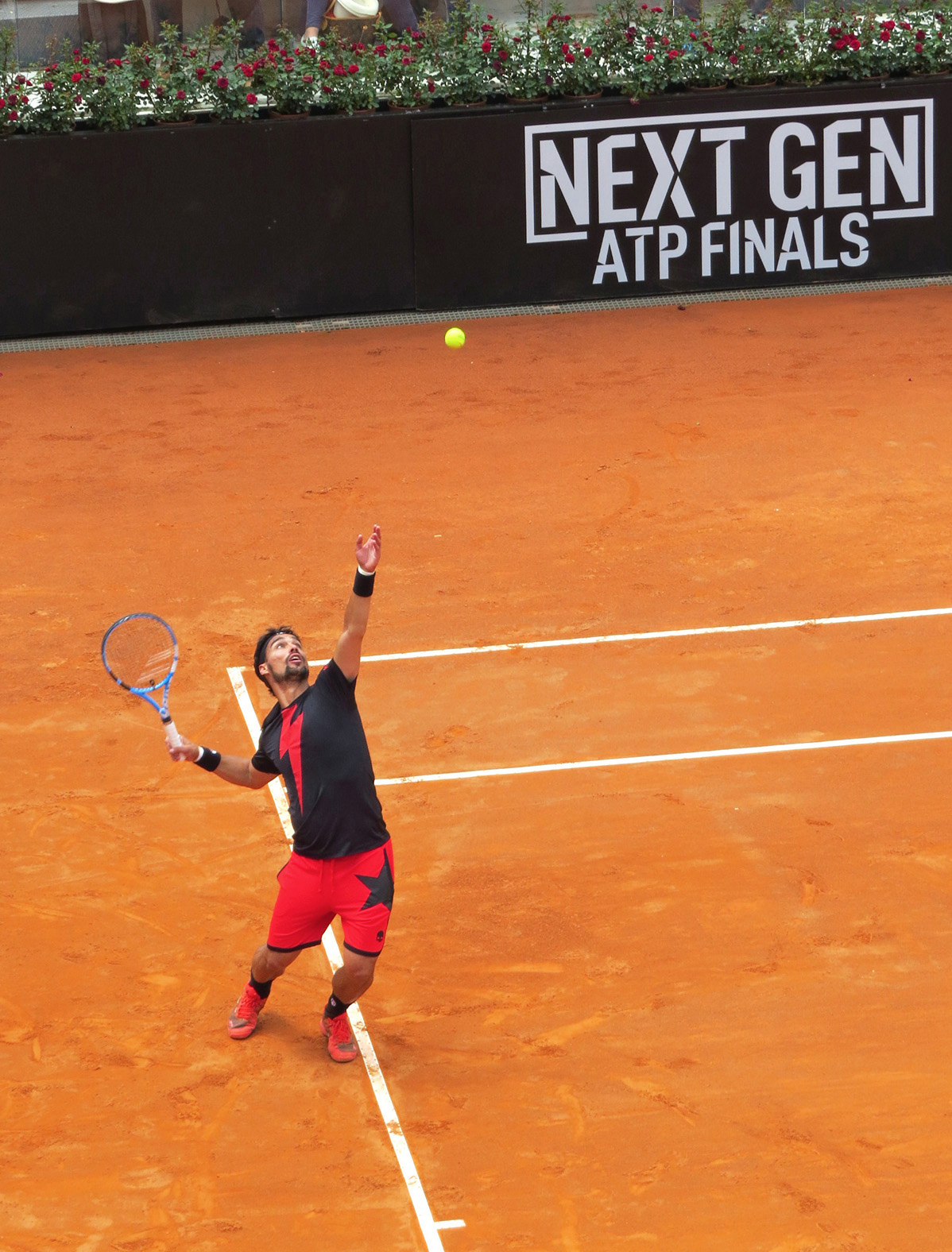 Fabio Fognini at the service