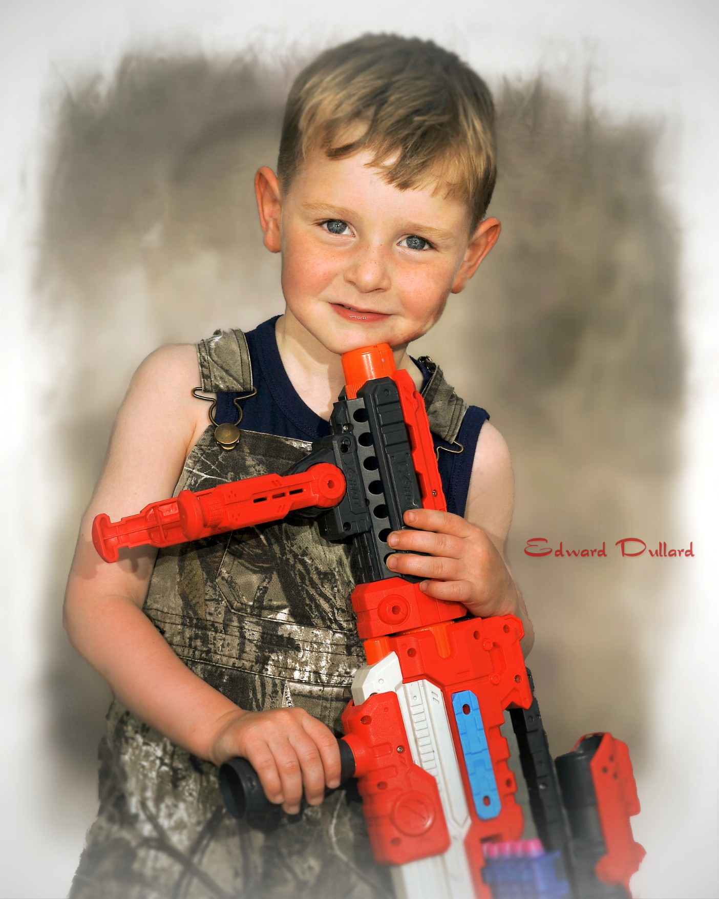 Little boy with a big gun.