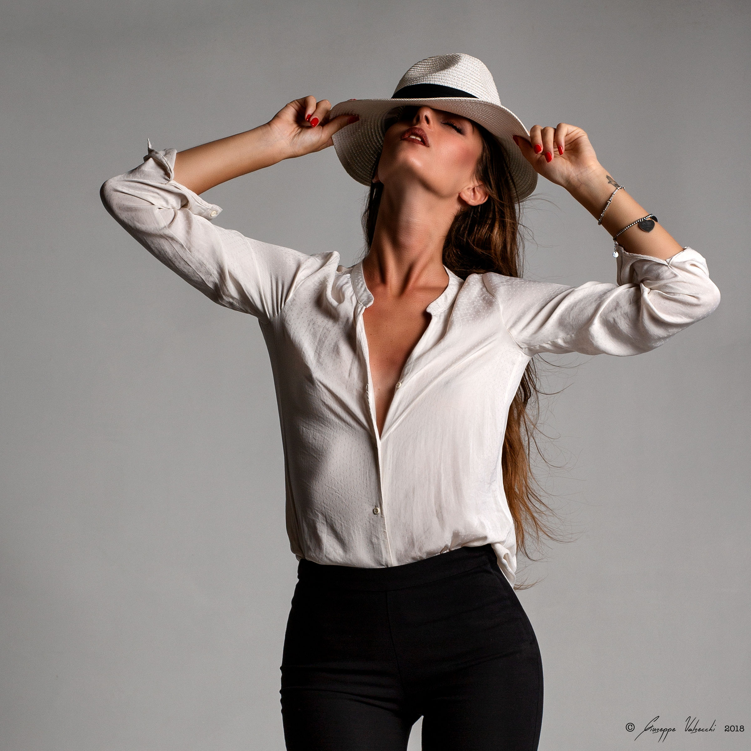 The girl in the hat....