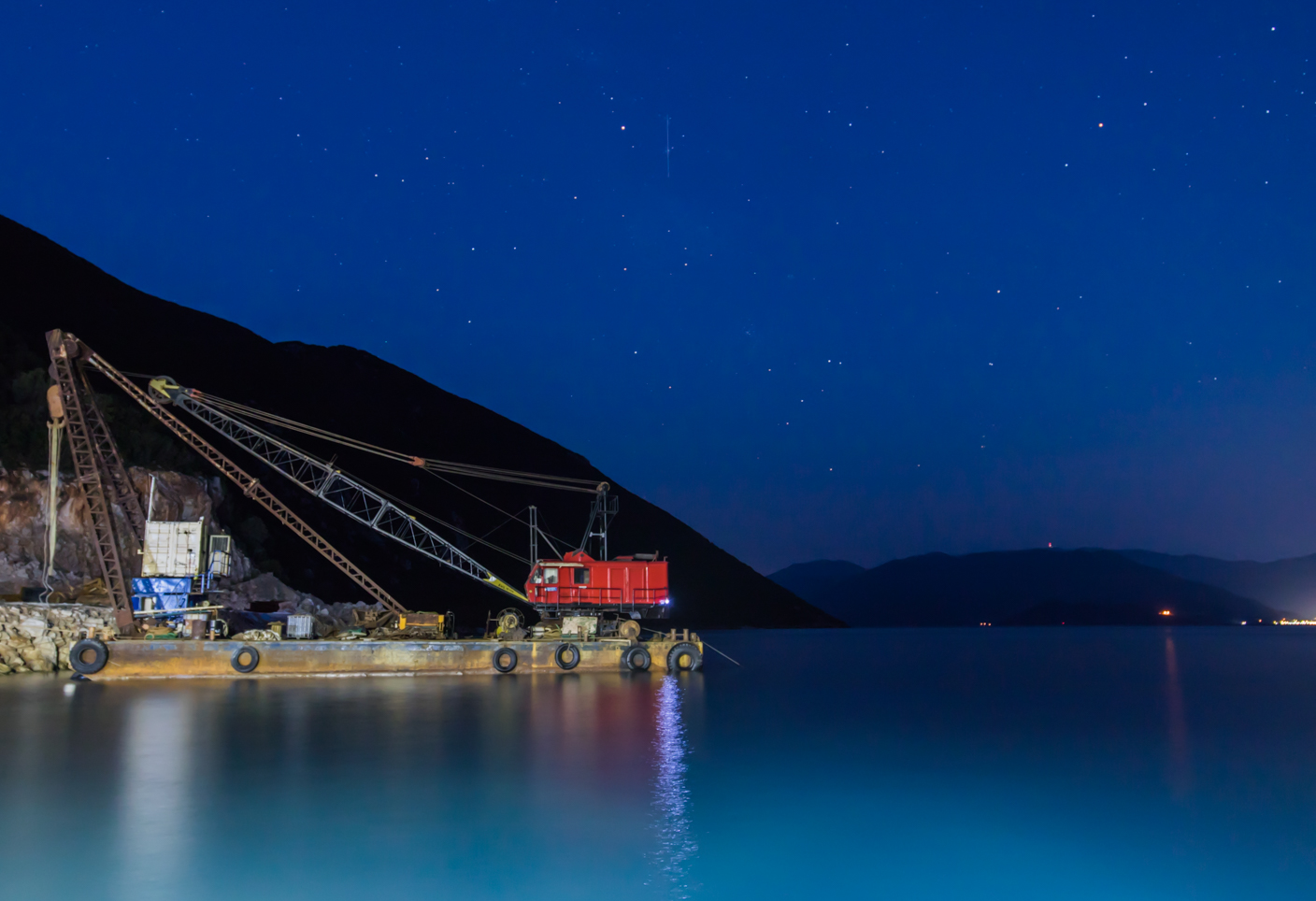 Barge on the water at night