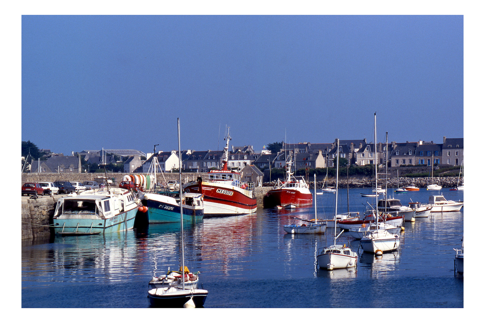 Fishing boats mowed in port.