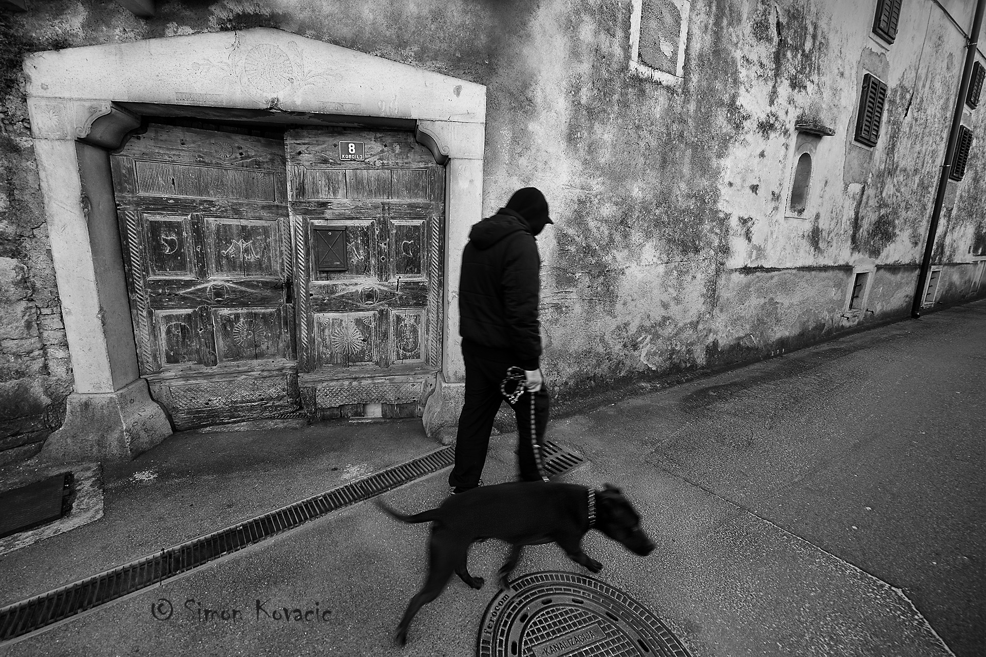 Man with black dog