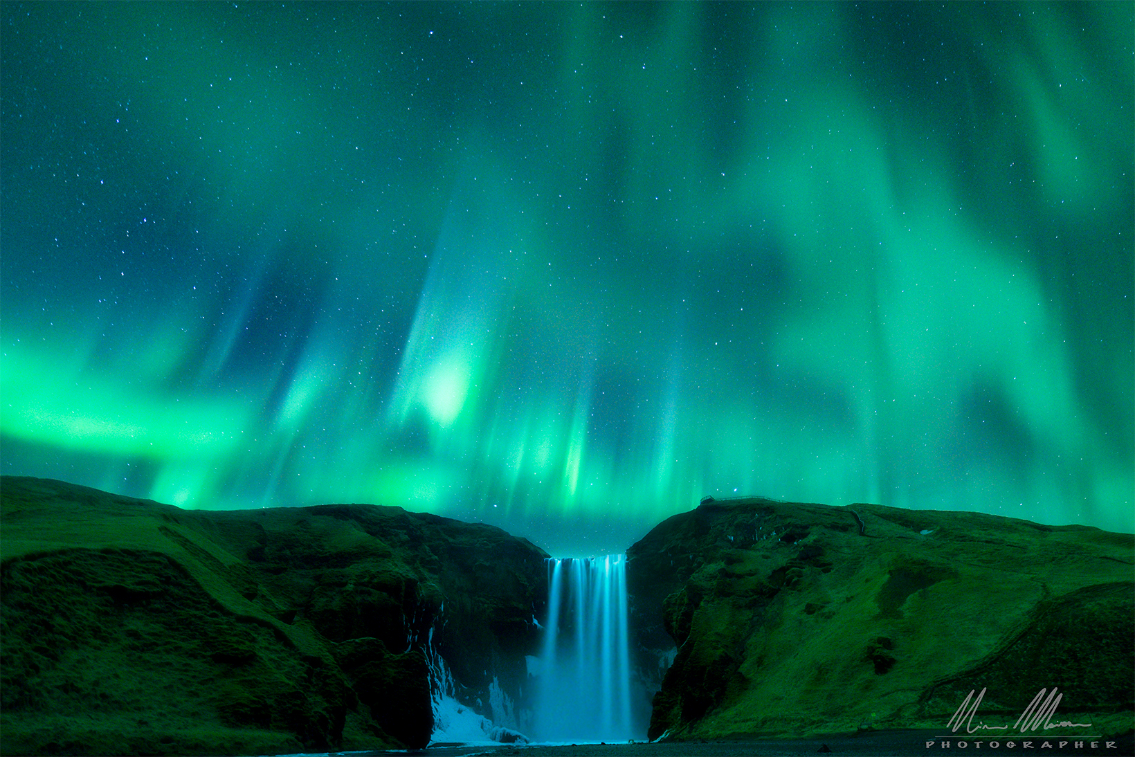 Skogafoss below Northern Lights