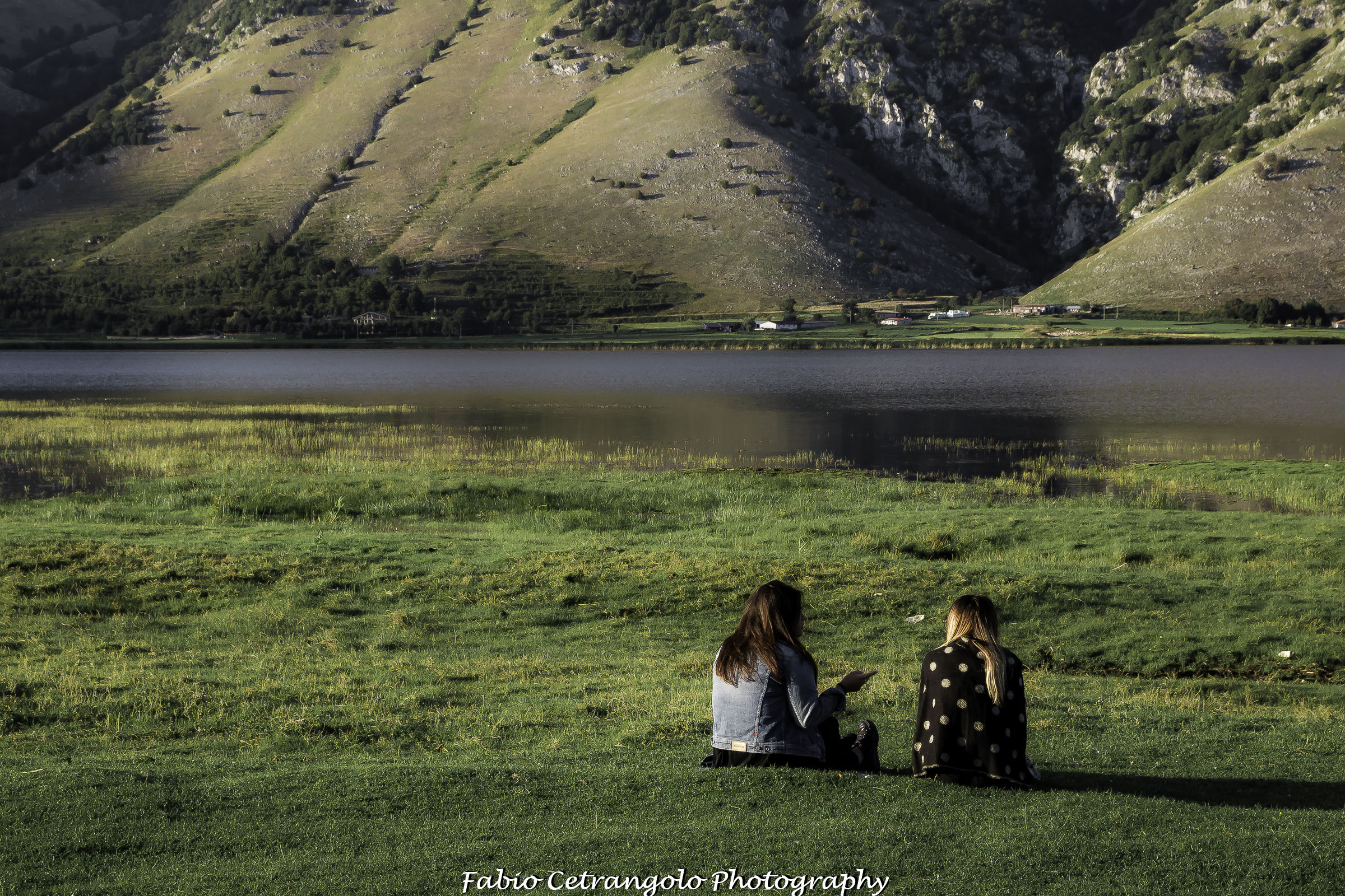 A chat on the lakeshore.