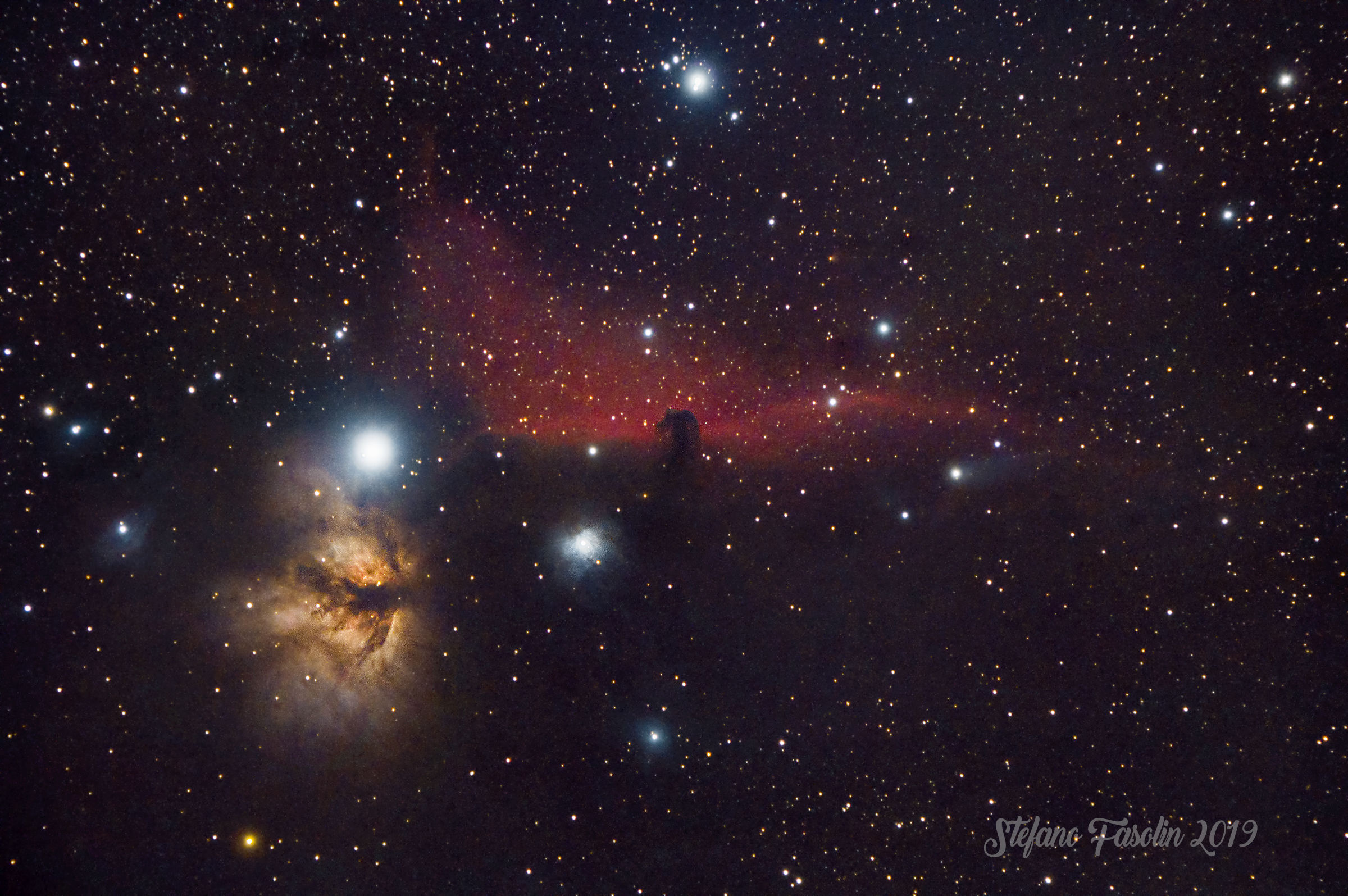 Flame and horse head in Orion