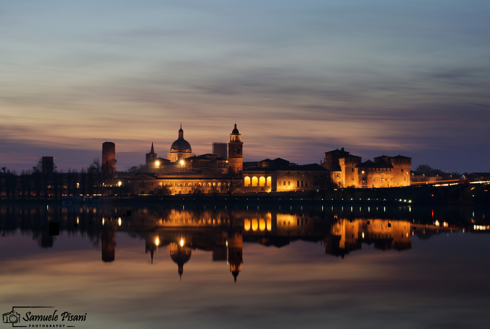 The Sun falls behind the city