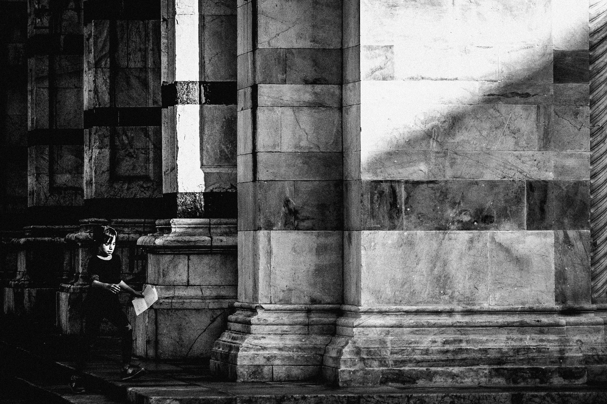 The little girl, the cathedral and the Sun.