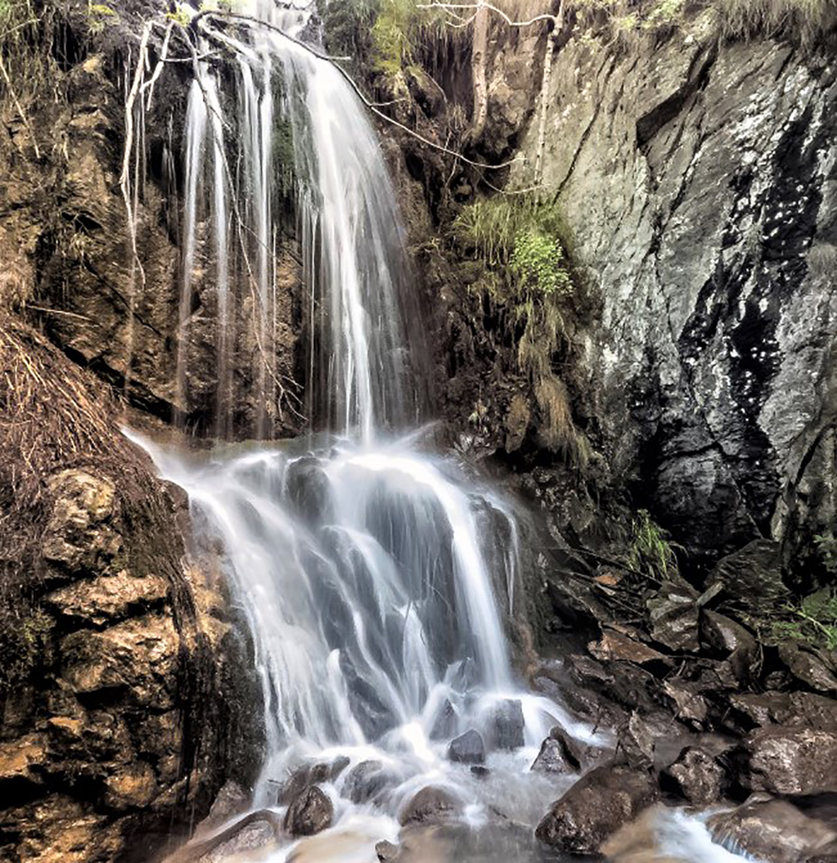 Tumpi Waterfall by Pourrieres