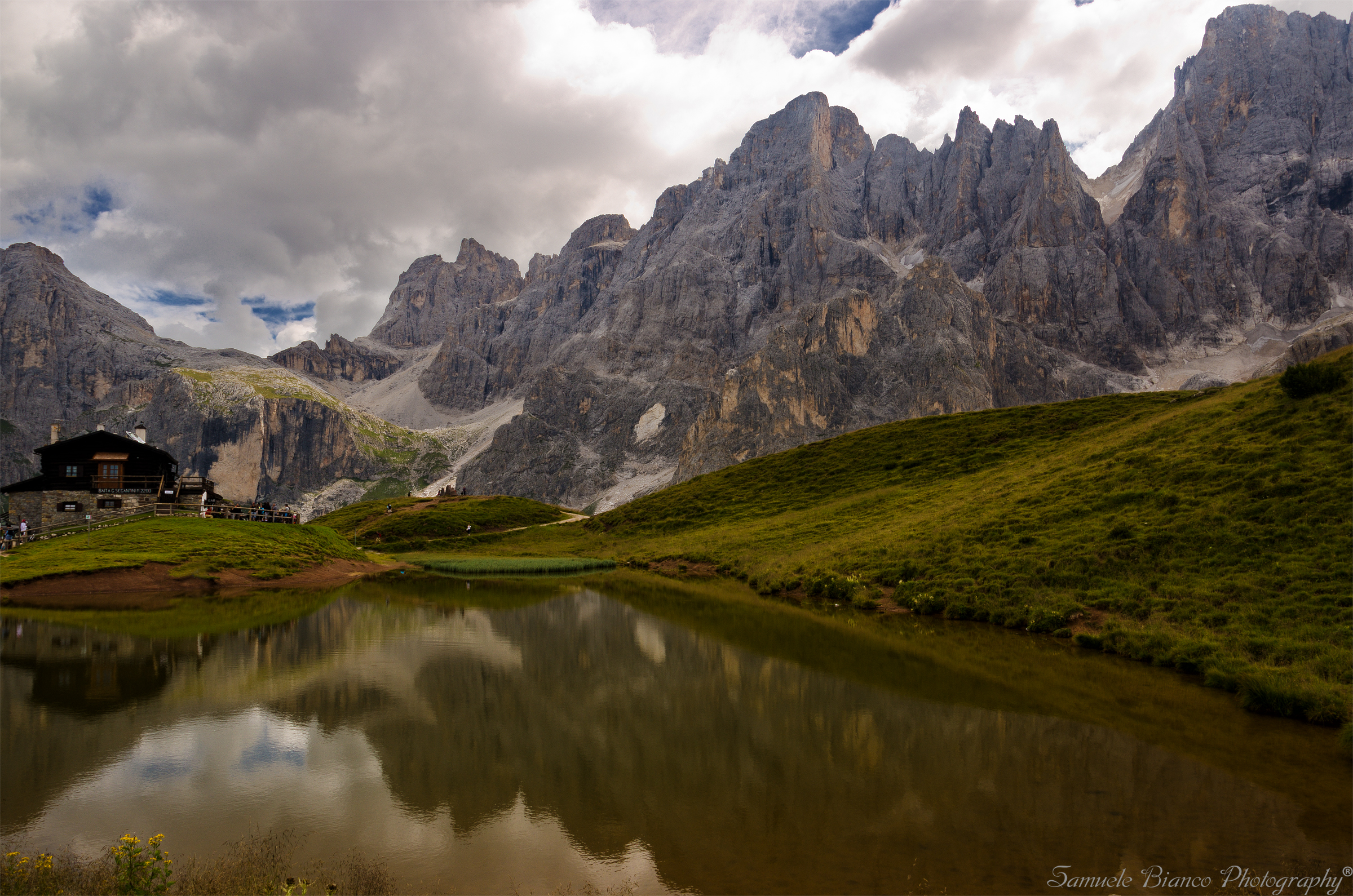 The pond Baita Segantini and the peaks