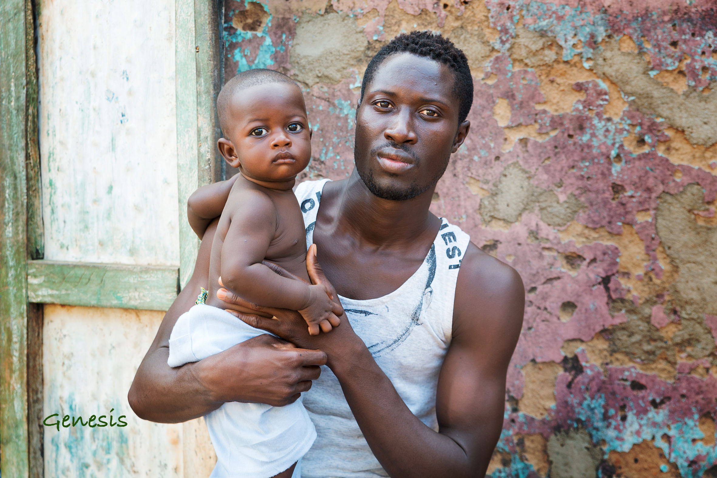 Padre con bambino, Ghana