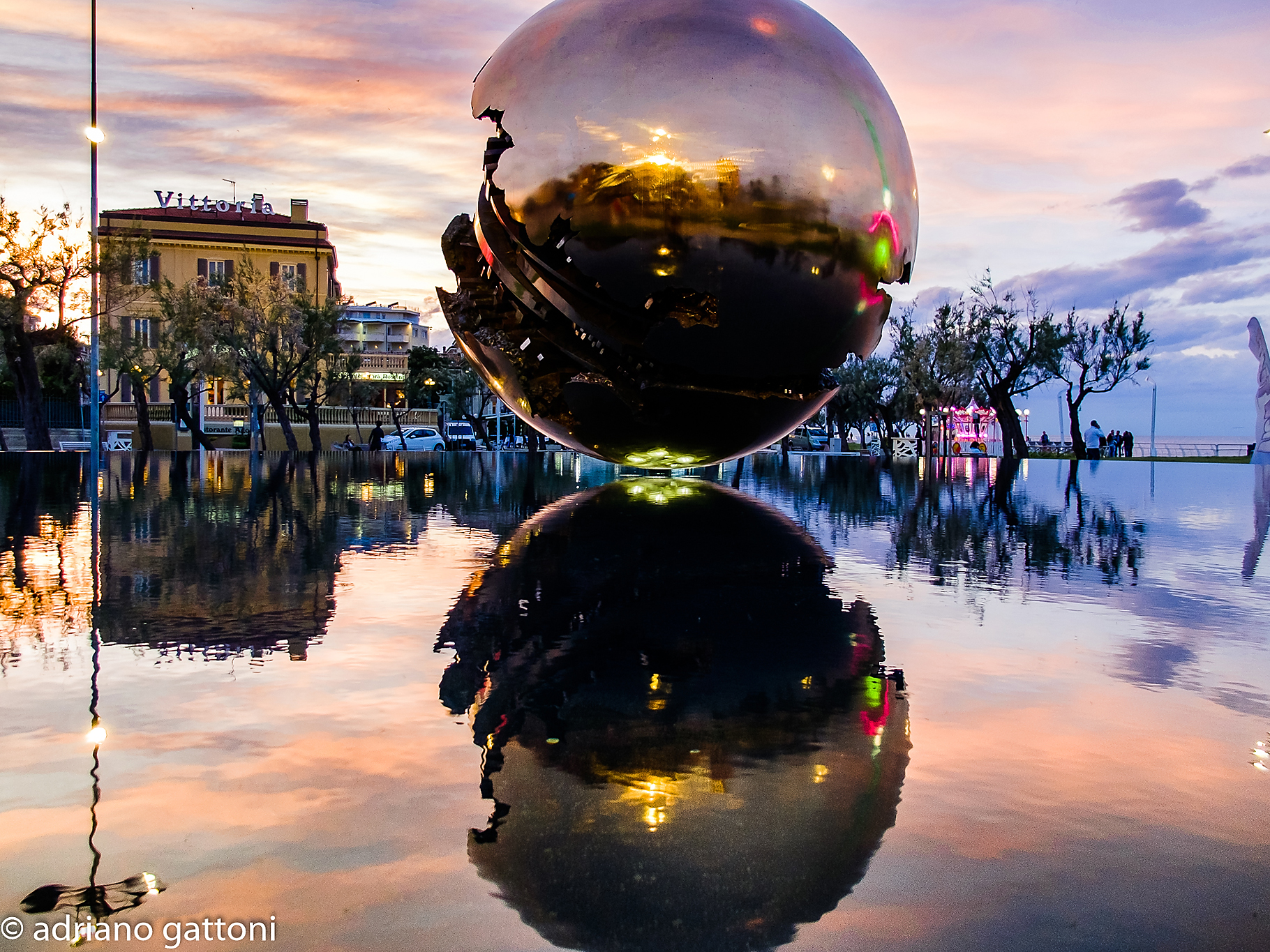 Reflections of a sunset on the "big sphere"