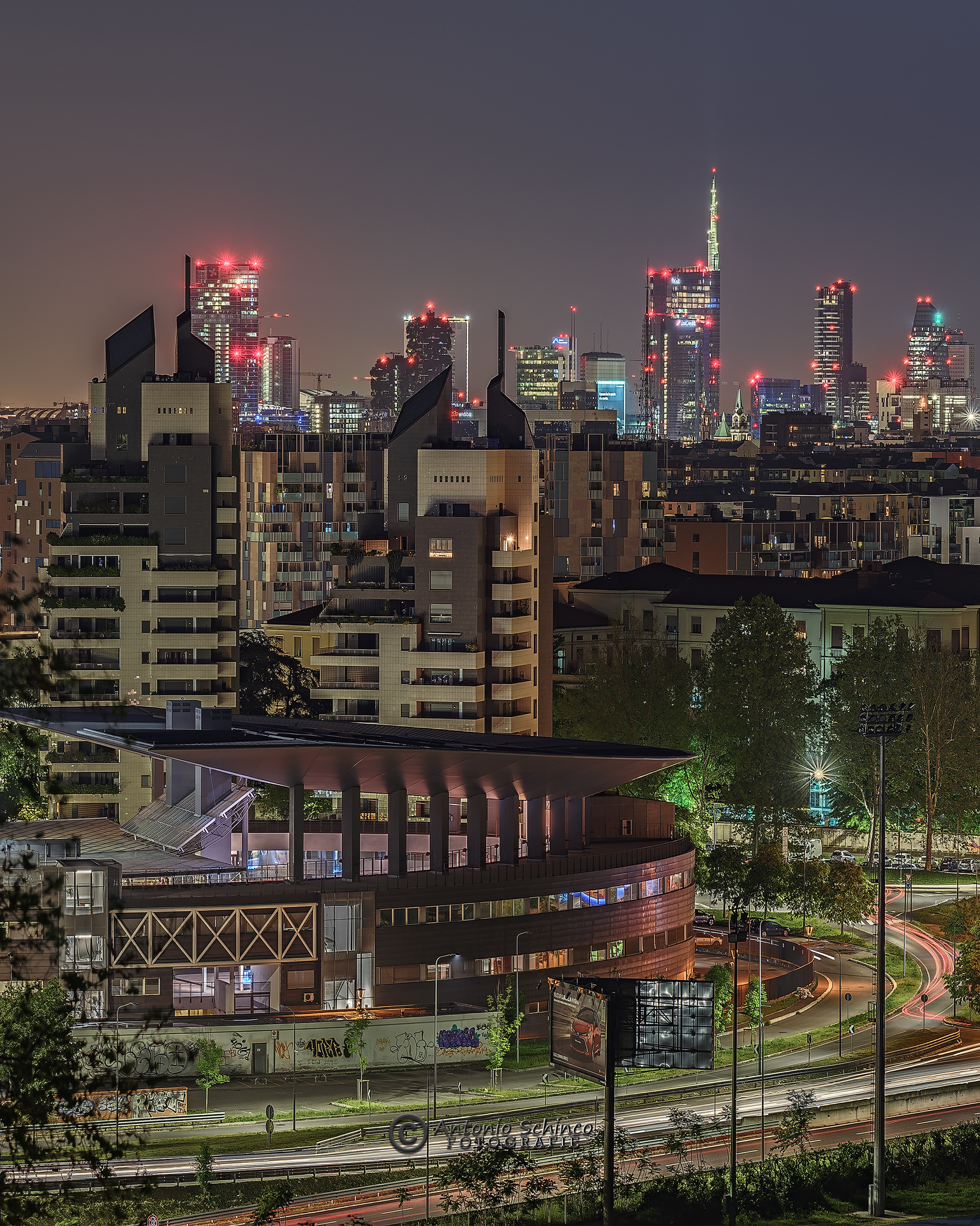Night Skyline from the park Monte Stella (vertical)