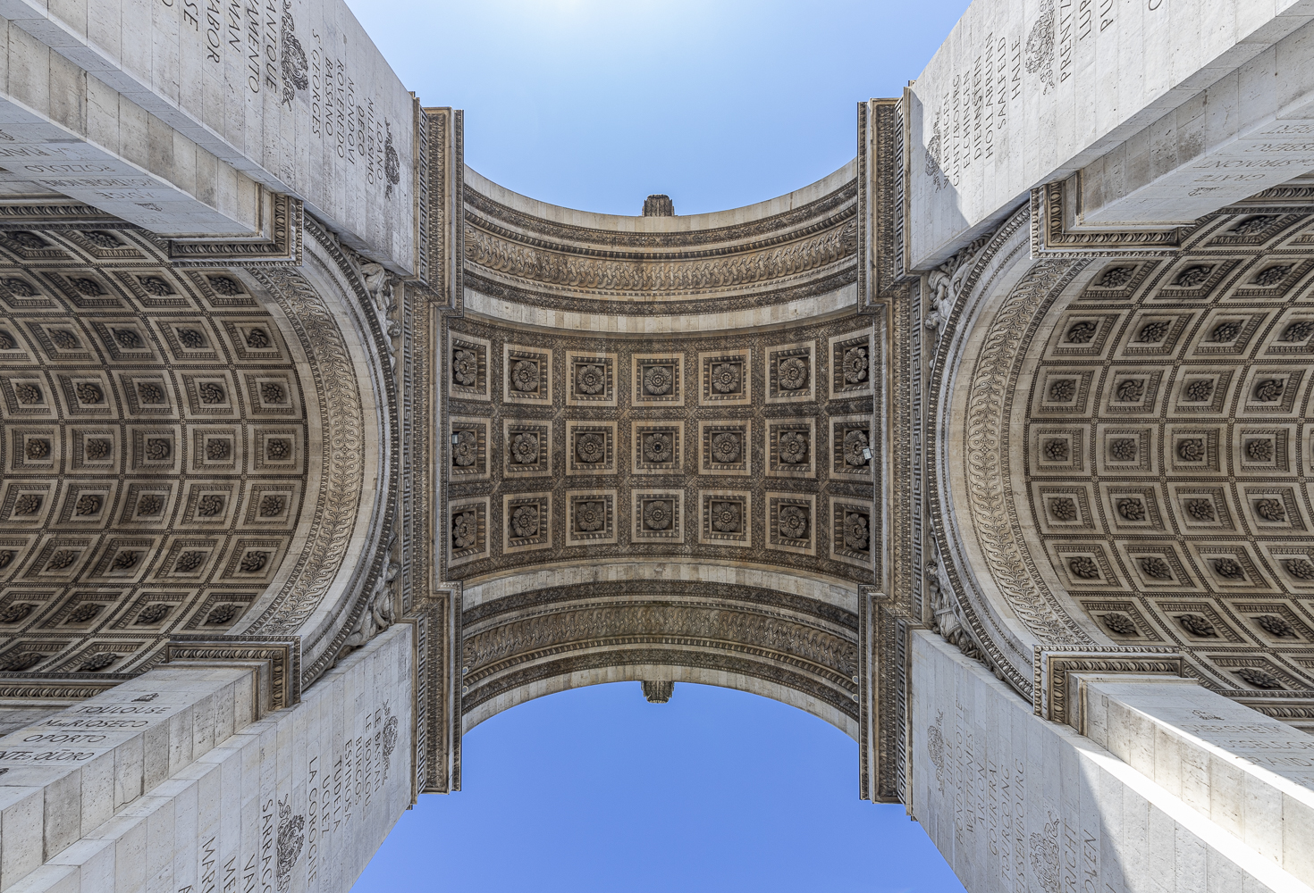 At the base of the arch