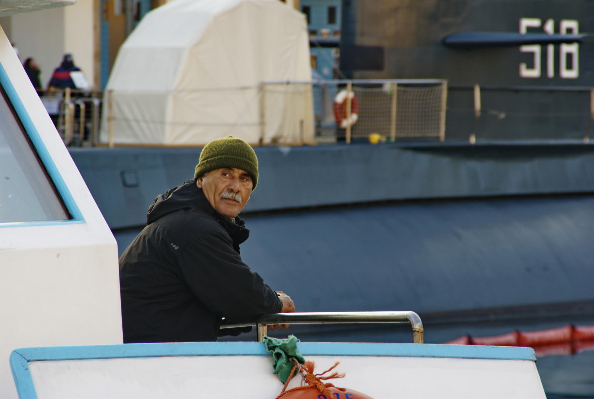 The Man in front of the submarine