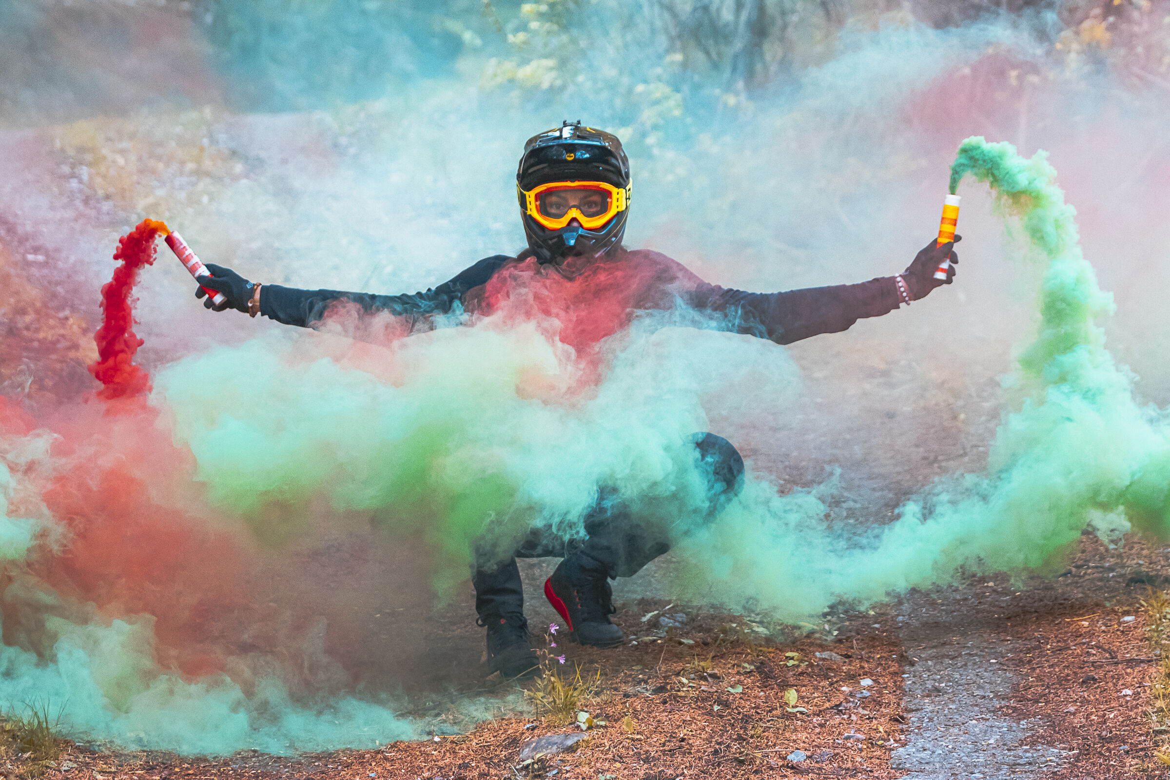 Downhill riders and smoke bombs