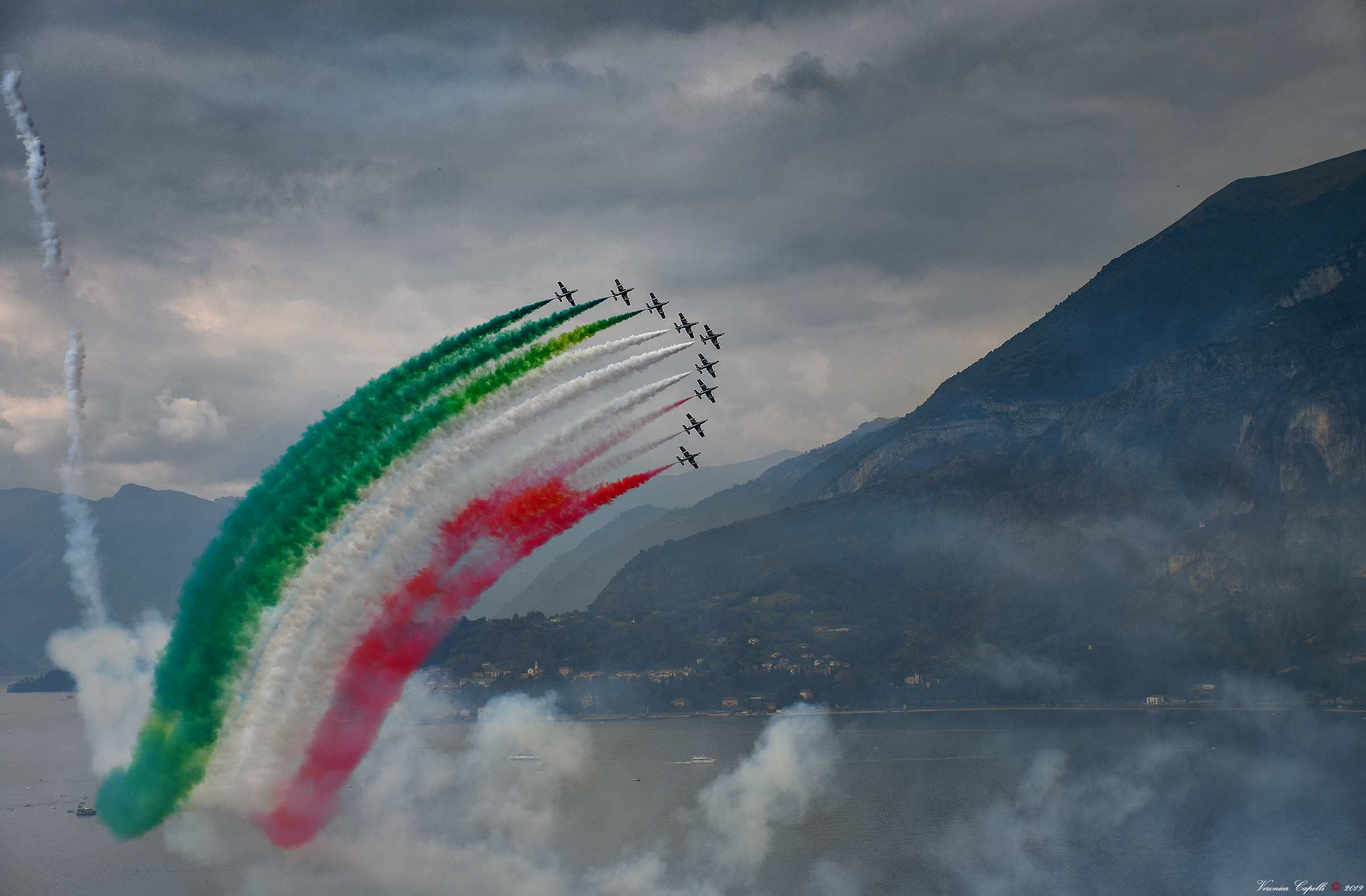 Tricolor in the grey sky of Varenna