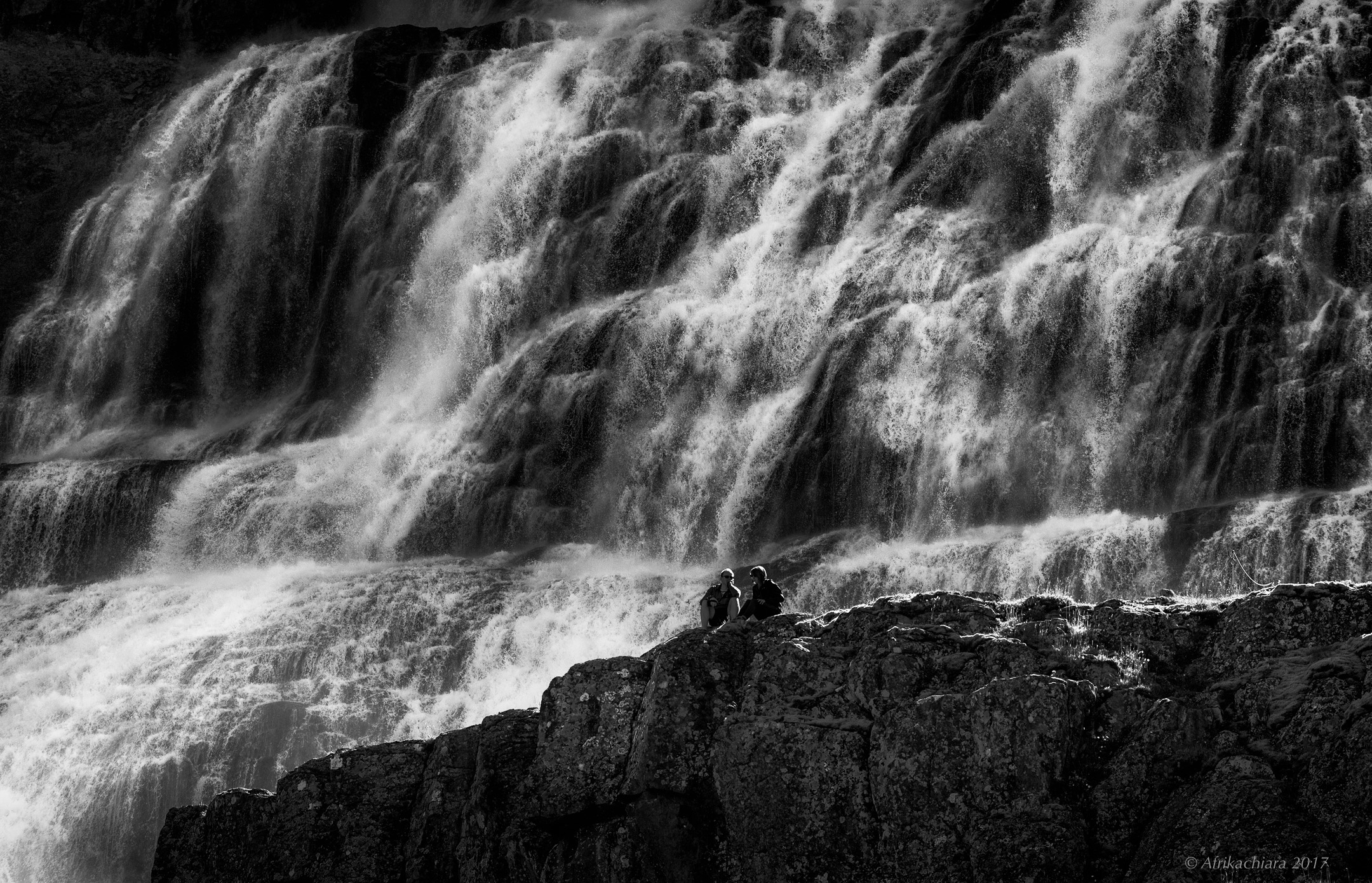 At the foot of the waterfall