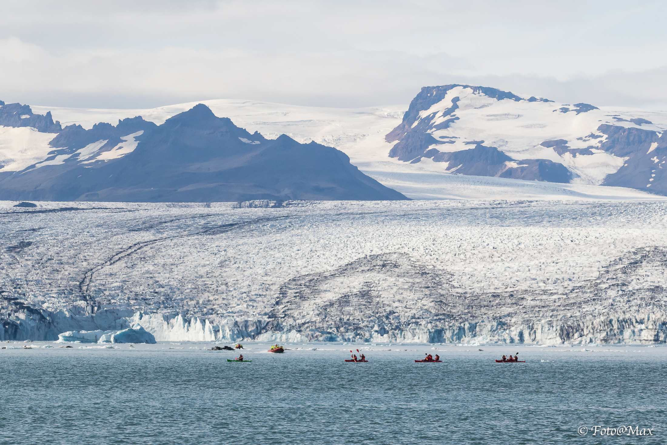 paddling in the middle of the icebergs