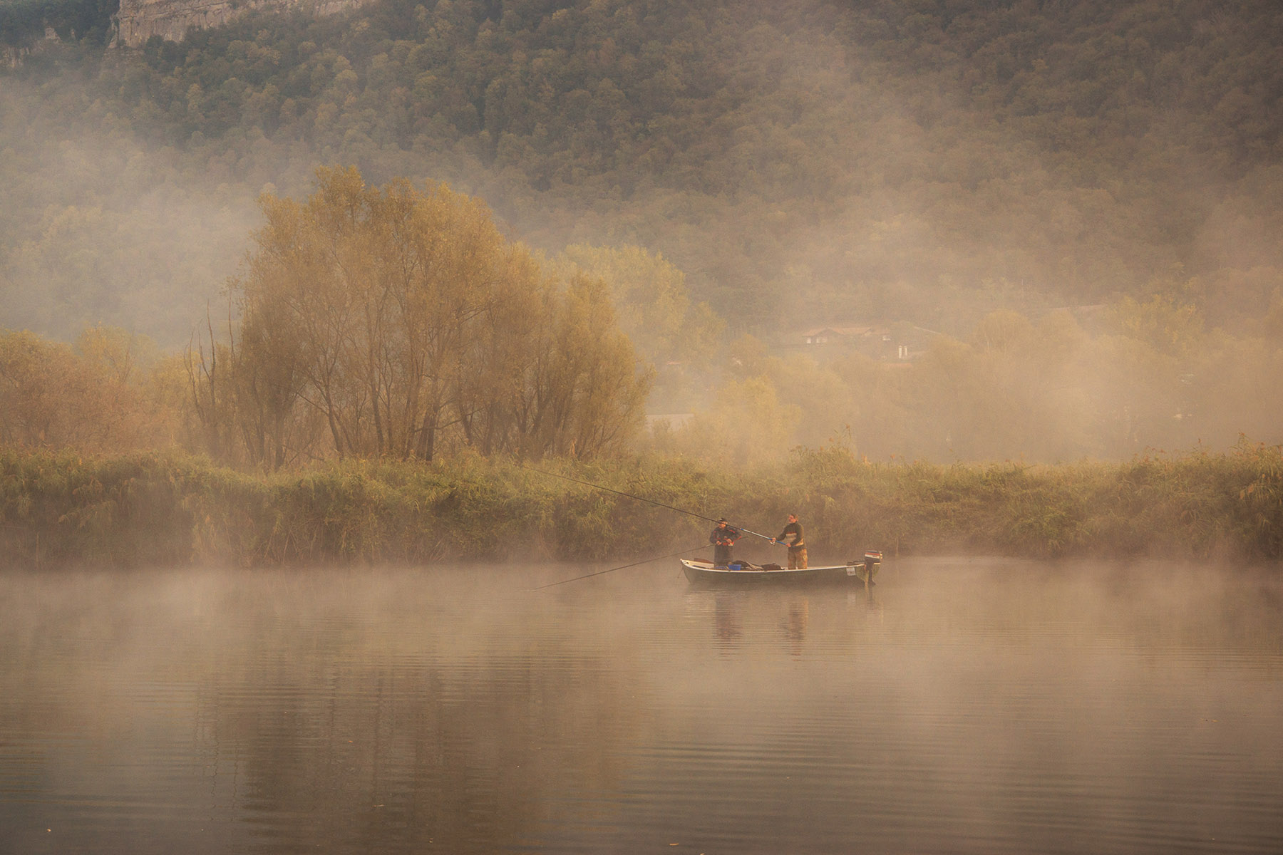 fishermen in the fog