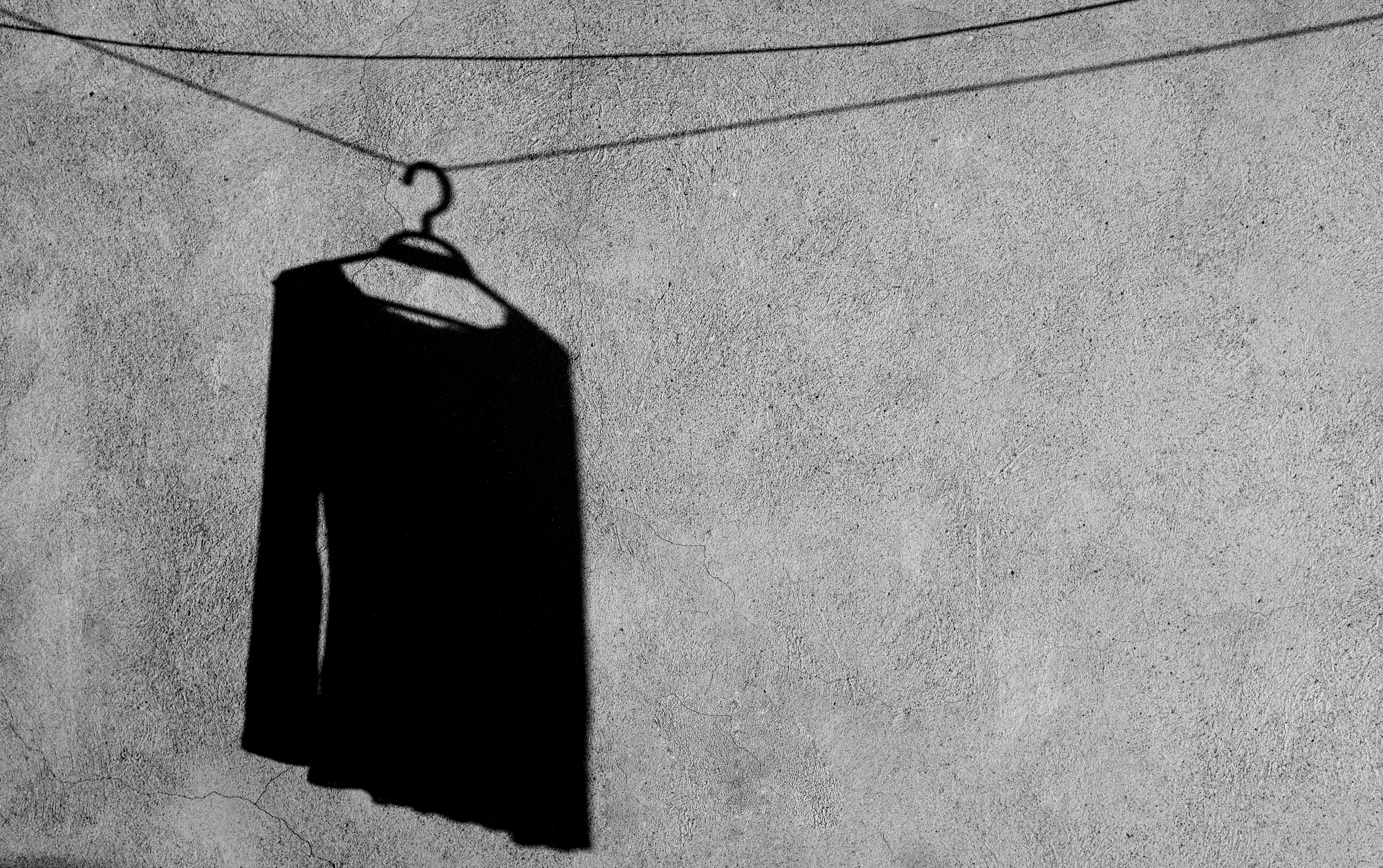 Hanging on a wire... shadowy