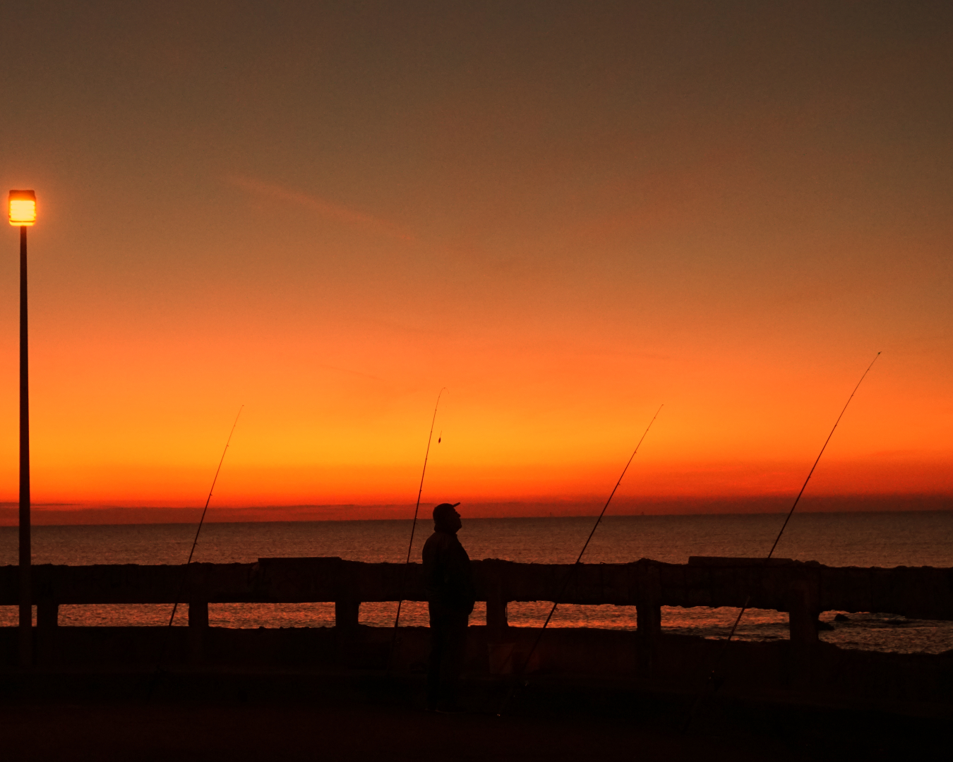 The quiet fisherman in sweet waiting.