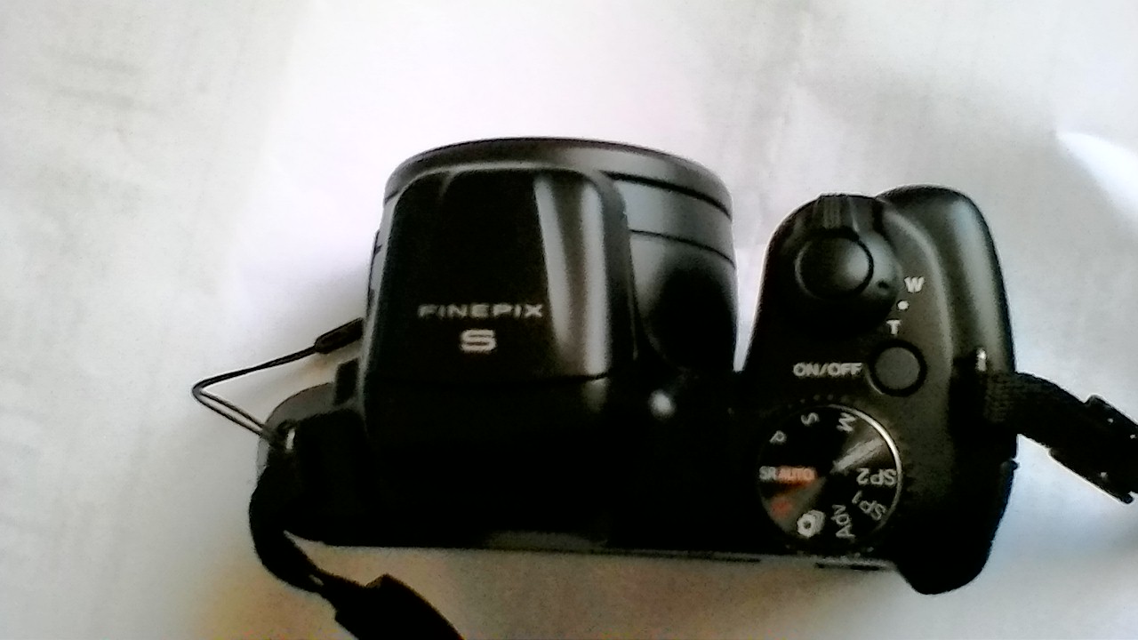 My former travel camera Finepix s8600