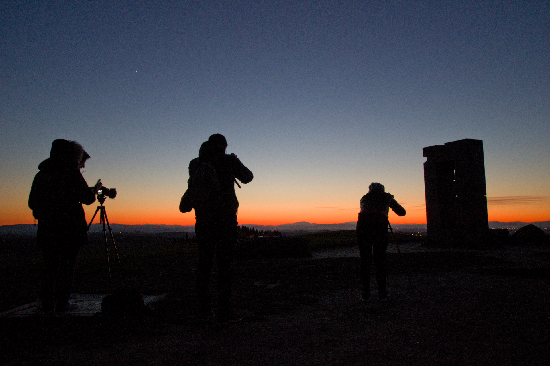 Fotografi all'imbrunire nelle Crete Senesi