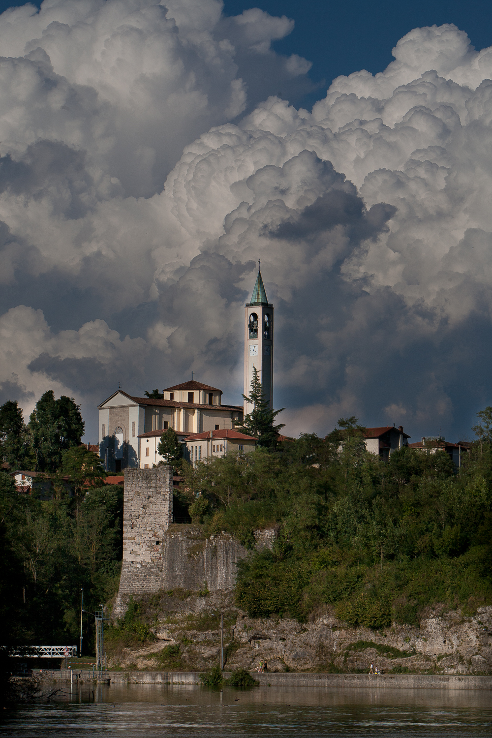 Capriate St. Gervasio Church with thunderstorm