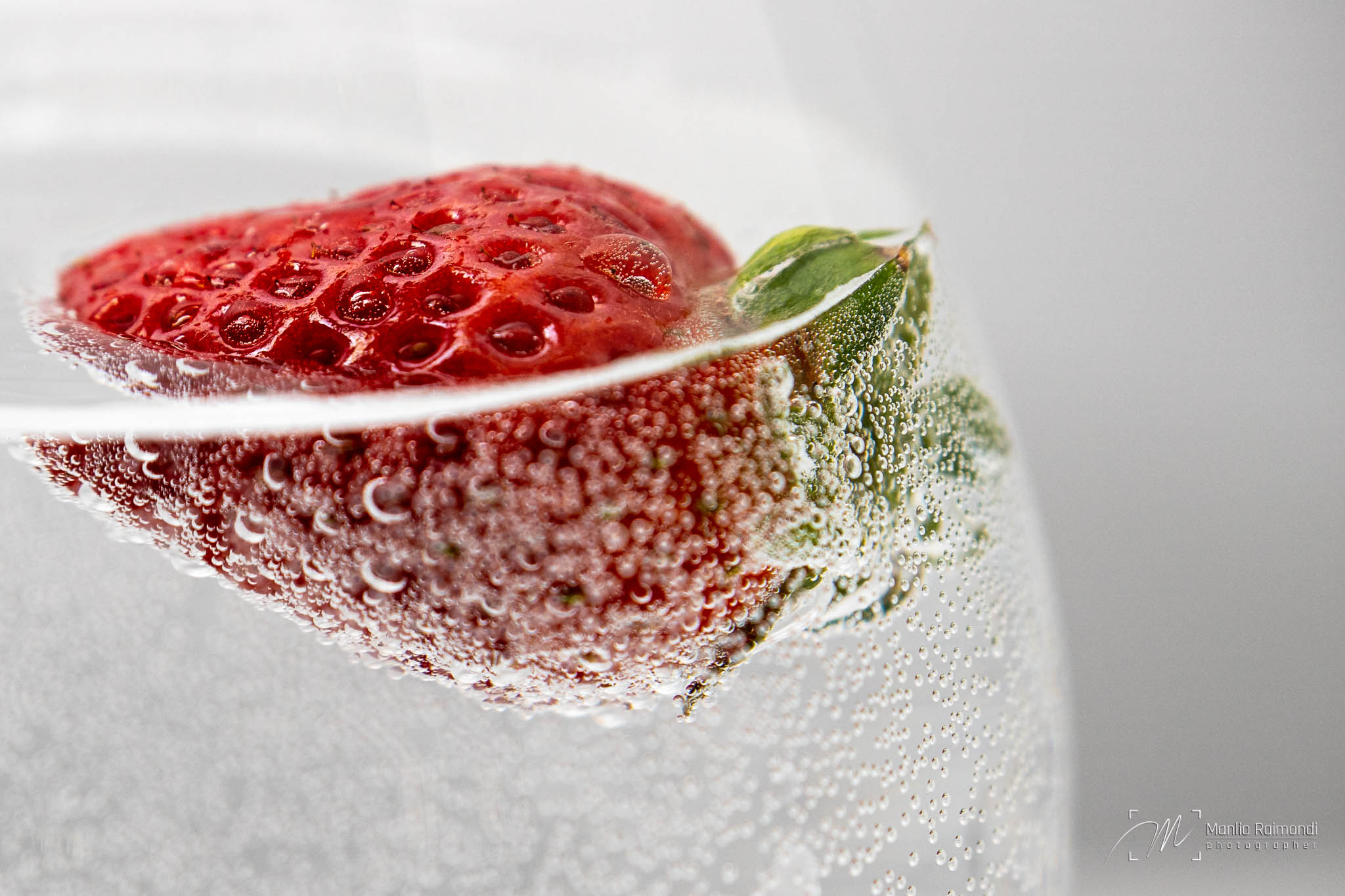 Strawberry in carbonated water