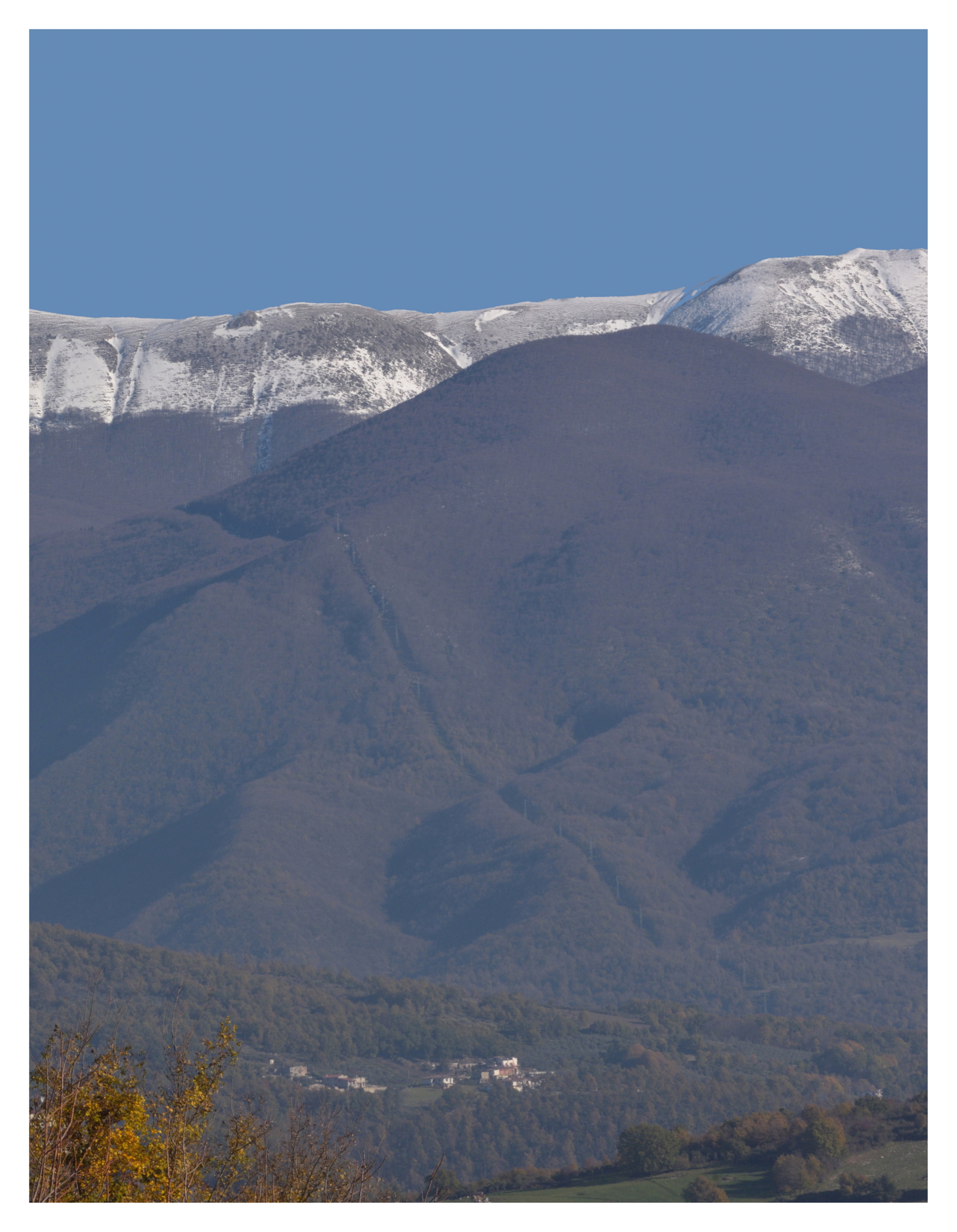 Few houses under the mountain