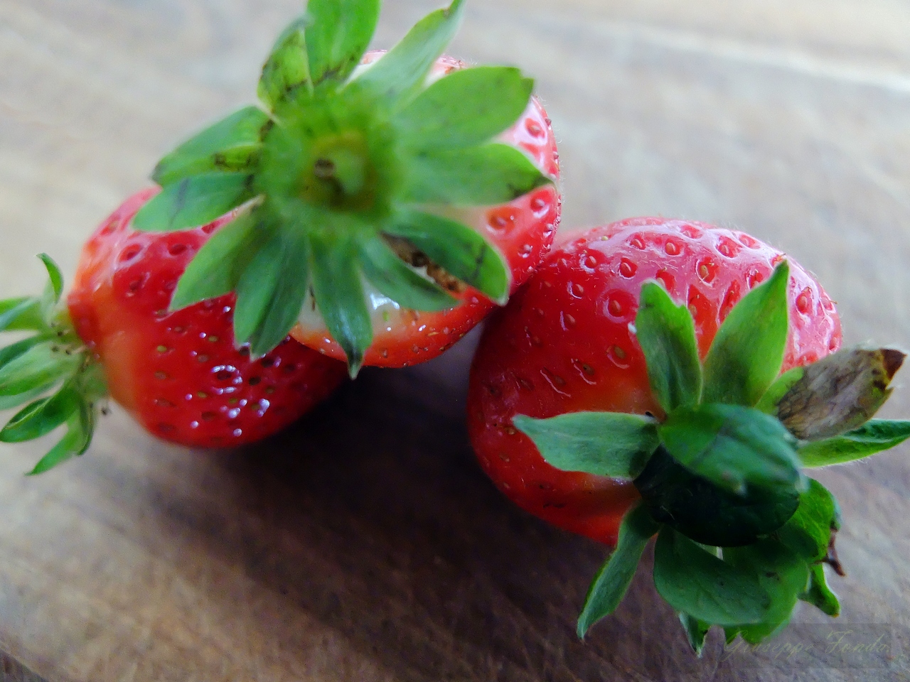 three strawberries