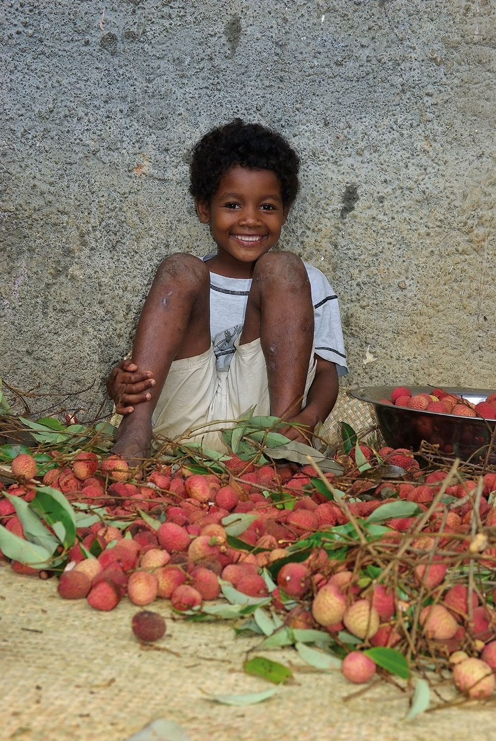 Tsosya immersed in letchis